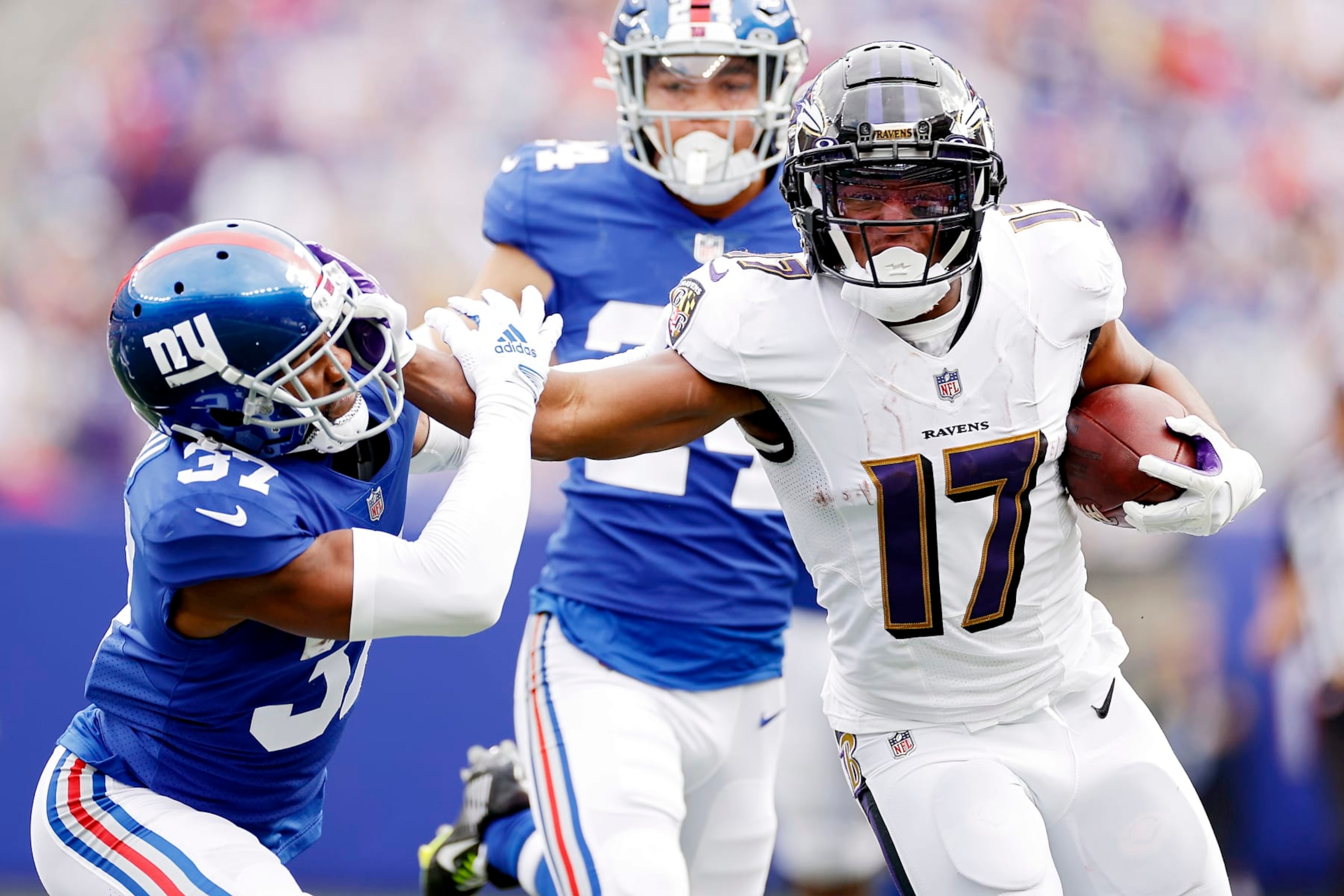 EAST RUTHERFORD, NEW JERSEY - OCTOBER 16: Kenyan Drake #17 of the Baltimore Ravens runs the ball against Fabian Moreau #37 of the New York Giants during the second quarter at MetLife Stadium on October 16, 2022 in East Rutherford, New Jersey. (Photo by Sarah Stier/Getty Images)