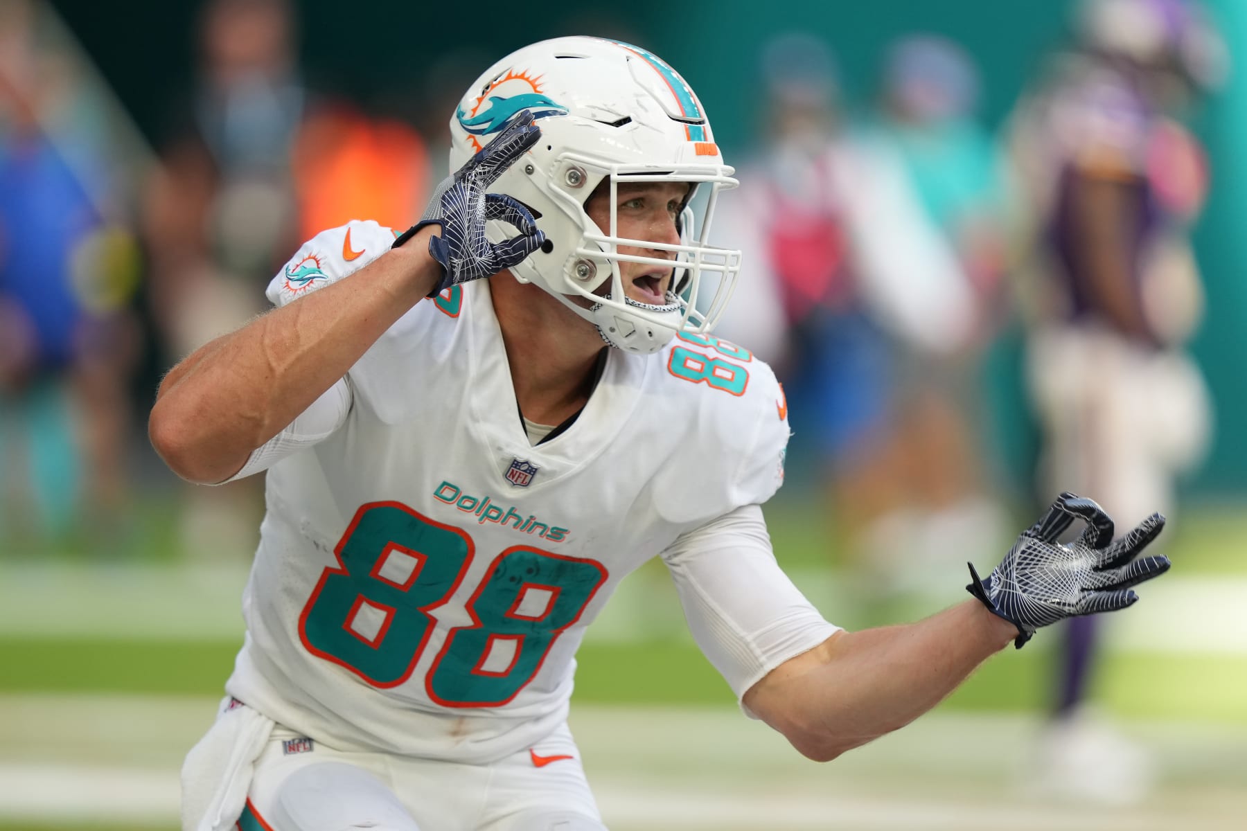MIAMI GARDENS, FLORIDA - OCTOBER 16: Mike Gesicki #88 of the Miami Dolphins celebrates a touchdown reception from Teddy Bridgewater #5 during the fourth quarter against the Minnesota Vikings at Hard Rock Stadium on October 16, 2022 in Miami Gardens, Florida. (Photo by Eric Espada/Getty Images)