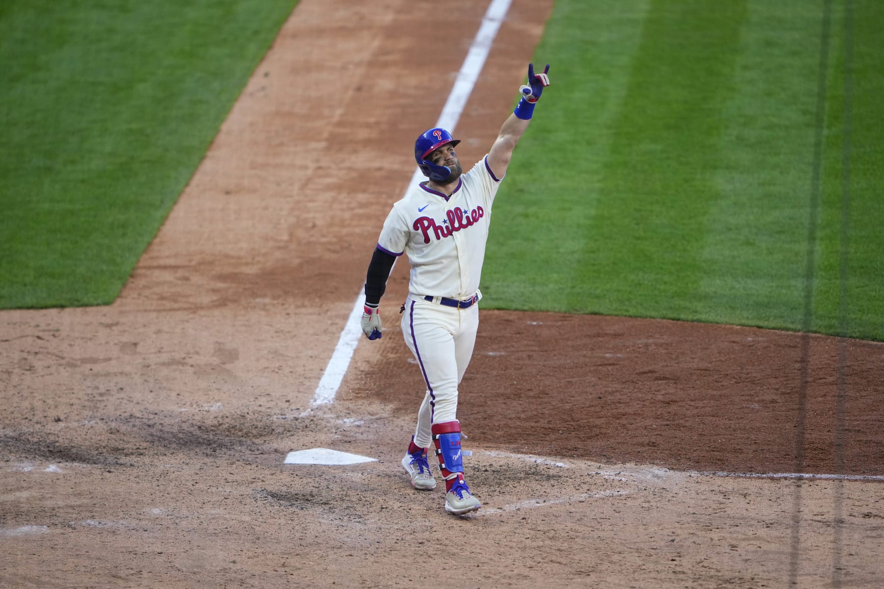 PHILADELPHIA, PA - OCTOBER 15: Philadelphia Phillies Designated Hitter Bryce Harper (3) races to hitting a home run after crossing home plate during the eighth inning of Game 4 of the NLDS between the Atlanta Braves and the Philadelphia Phillies on October 15, 2022, at Citizens Bank Park in Philadelphia, PA.(Photo by Gregory Fisher/Icon Sportswire via Getty Images)