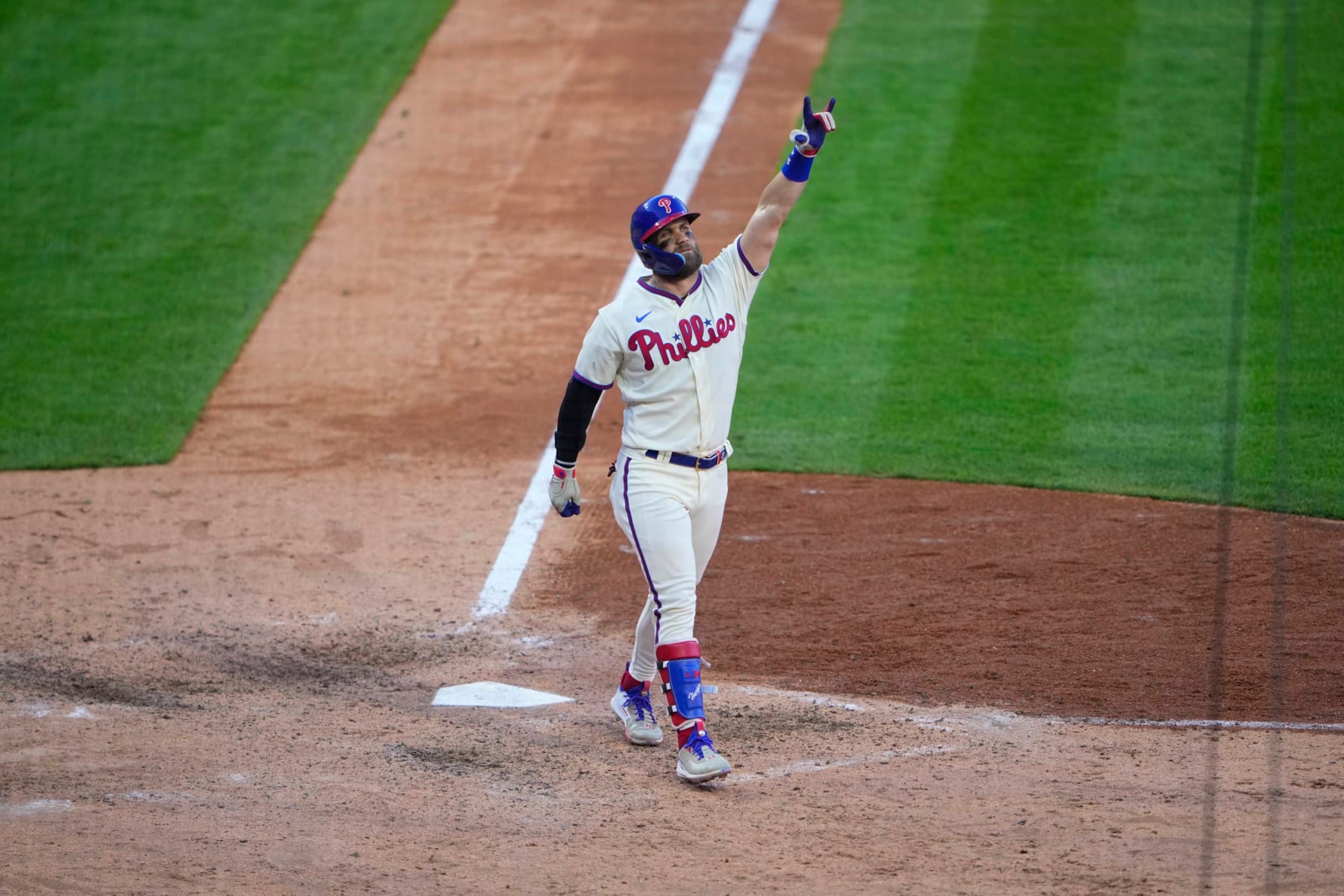 PHILADELPHIA, PA - OCTOBER 15: Philadelphia Phillies Designated Hitter Bryce Harper (3) races to hitting a home run after crossing home plate during the eighth inning of Game 4 of the NLDS between the Atlanta Braves and the Philadelphia Phillies on October 15, 2022, at Citizens Bank Park in Philadelphia, PA.(Photo by Gregory Fisher/Icon Sportswire via Getty Images)