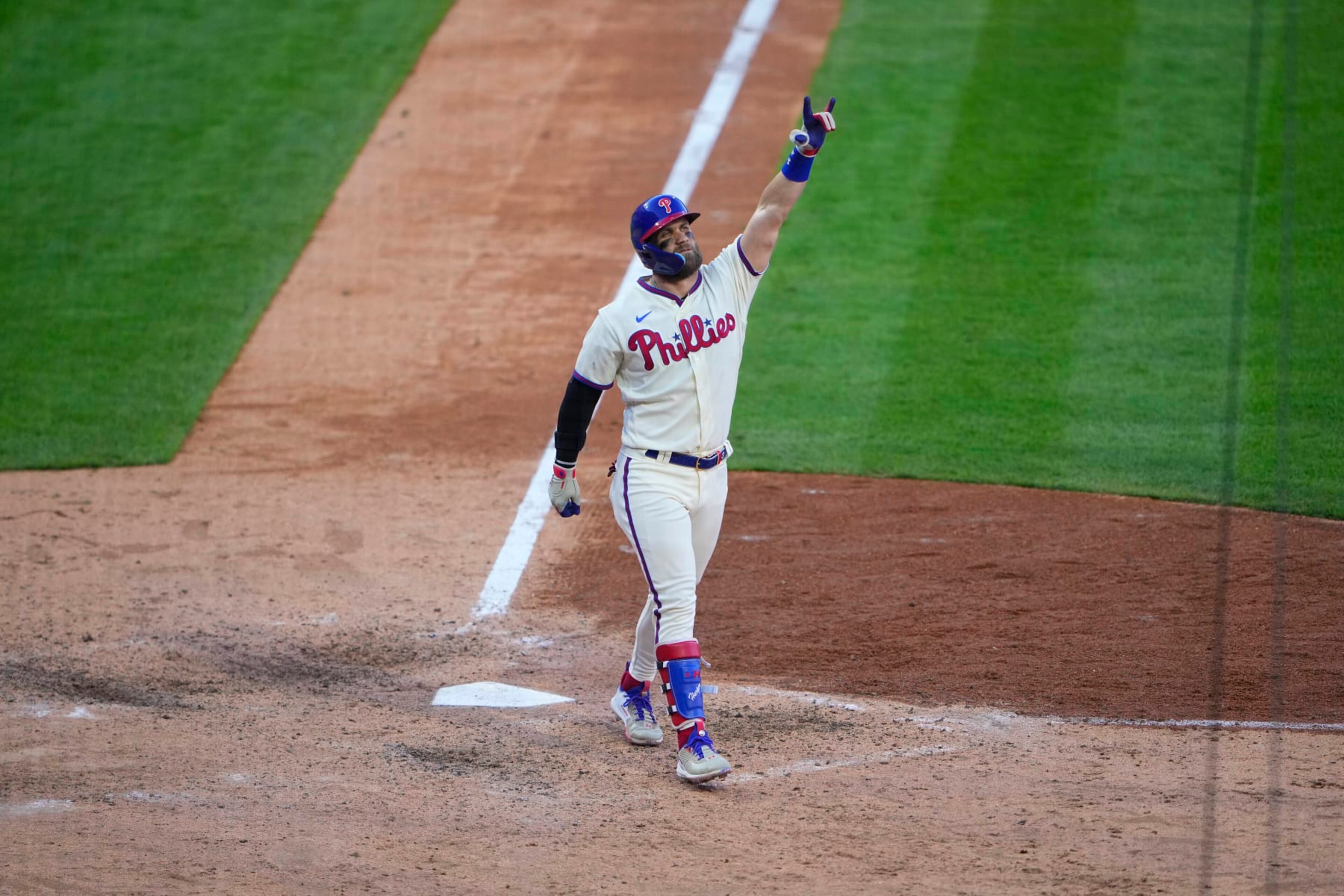 PHILADELPHIA, PA - OCTOBER 15: Philadelphia Phillies Designated Hitter Bryce Harper (3) races to hitting a home run after crossing home plate during the eighth inning of Game 4 of the NLDS between the Atlanta Braves and the Philadelphia Phillies on October 15, 2022, at Citizens Bank Park in Philadelphia, PA.(Photo by Gregory Fisher/Icon Sportswire via Getty Images)