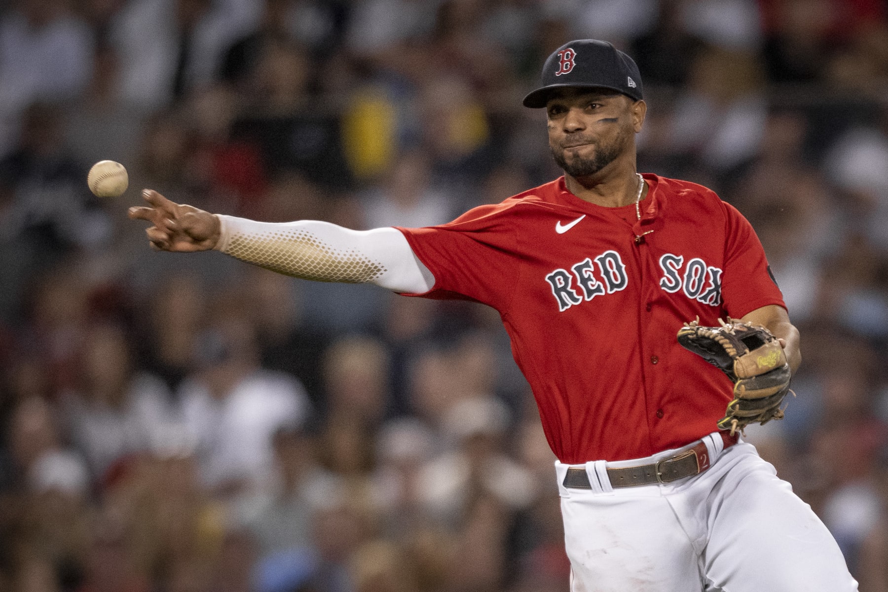 BOSTON, MA - AUGUST 13: Xander Bogaerts #2 of the Boston Red Sox throws to first for an out during the sixth inning of a game against the New York Yankees on August 13, 2022 at Fenway Park in Boston, Massachusetts. (Photo by Maddie Malhotra/Boston Red Sox/Getty Images)