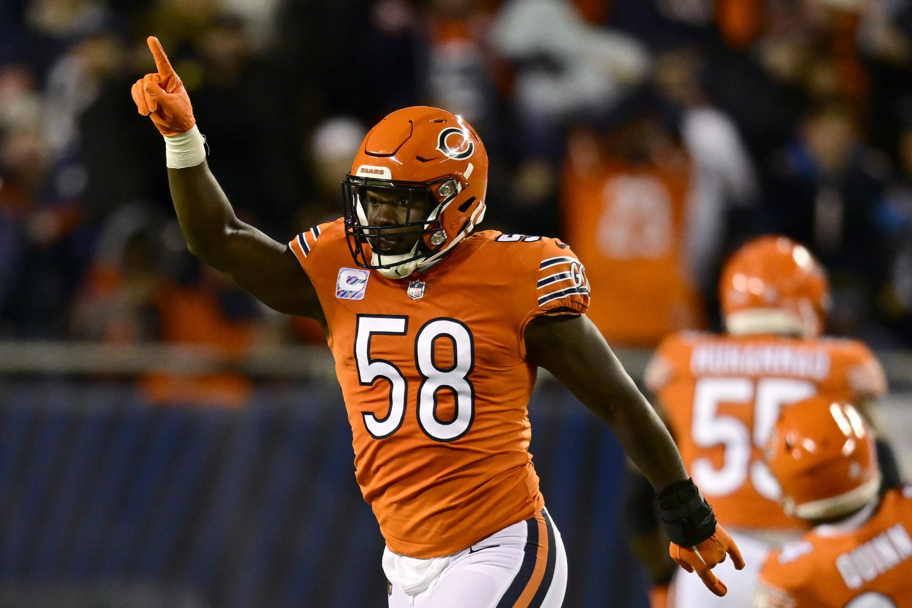 CHICAGO, ILLINOIS - OCTOBER 13: Roquan Smith #58 of the Chicago Bears reacts after a sack during the first quarter against the Washington Commanders at Soldier Field on October 13, 2022 in Chicago, Illinois. (Photo by Quinn Harris/Getty Images)