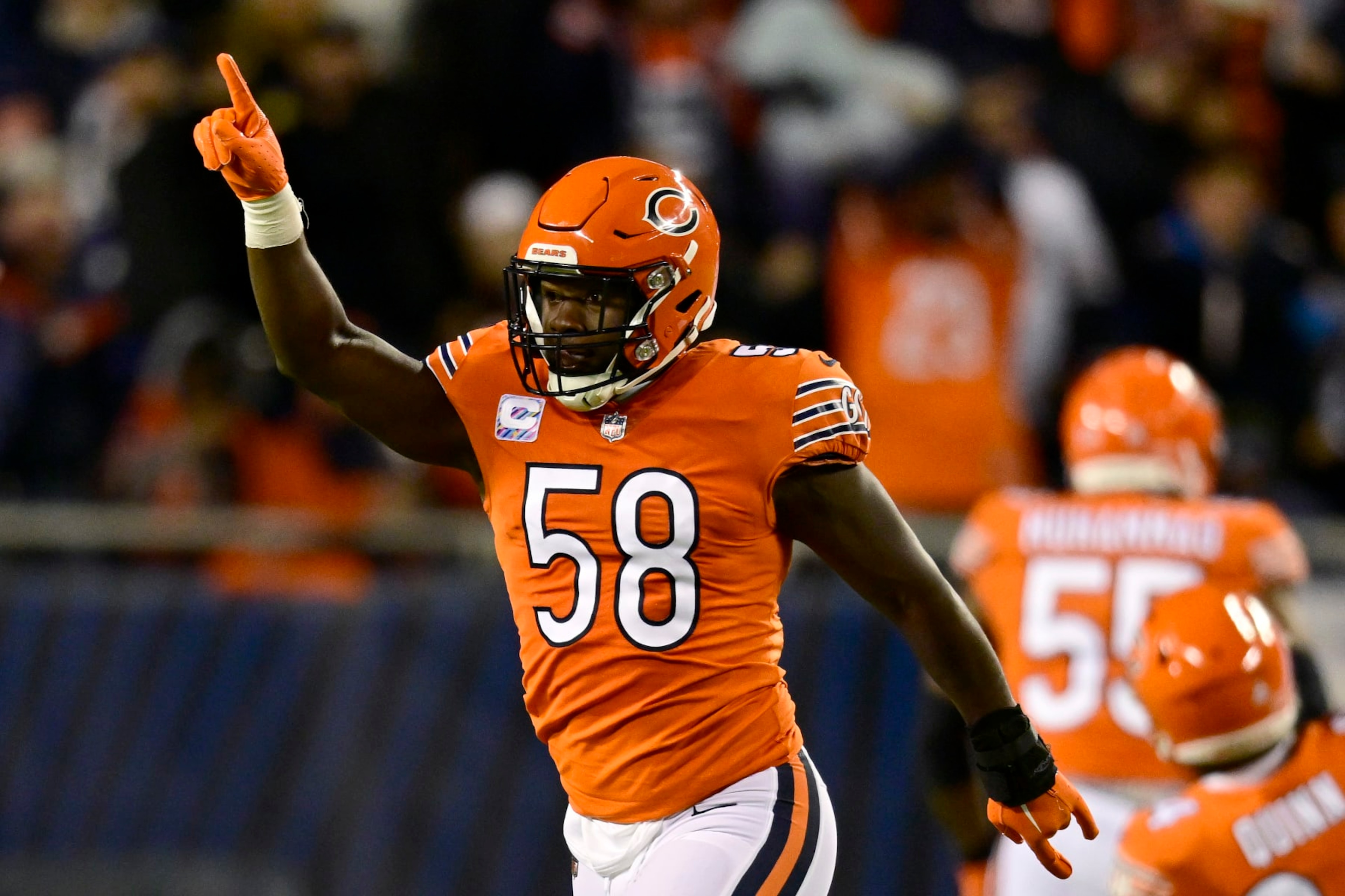 CHICAGO, ILLINOIS - OCTOBER 13: Roquan Smith #58 of the Chicago Bears reacts after a sack during the first quarter against the Washington Commanders at Soldier Field on October 13, 2022 in Chicago, Illinois. (Photo by Quinn Harris/Getty Images)