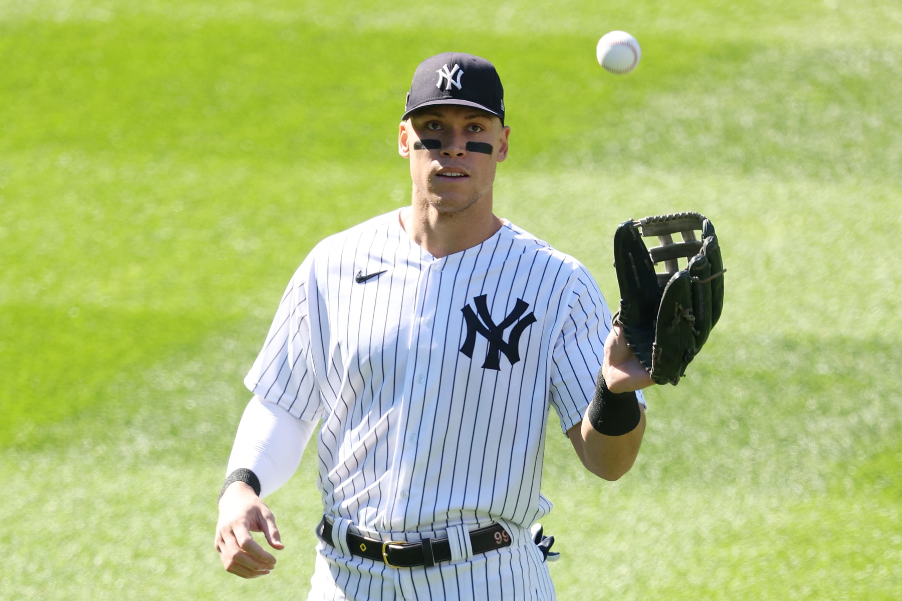 NEW YORK, NEW YORK - OCTOBER 14: Aaron Judge #99 of the New York Yankees warms up prior to game two of the American League Division Series against the Cleveland Guardians at Yankee Stadium on October 14, 2022 in New York, New York. (Photo by Jamie Squire/Getty Images)