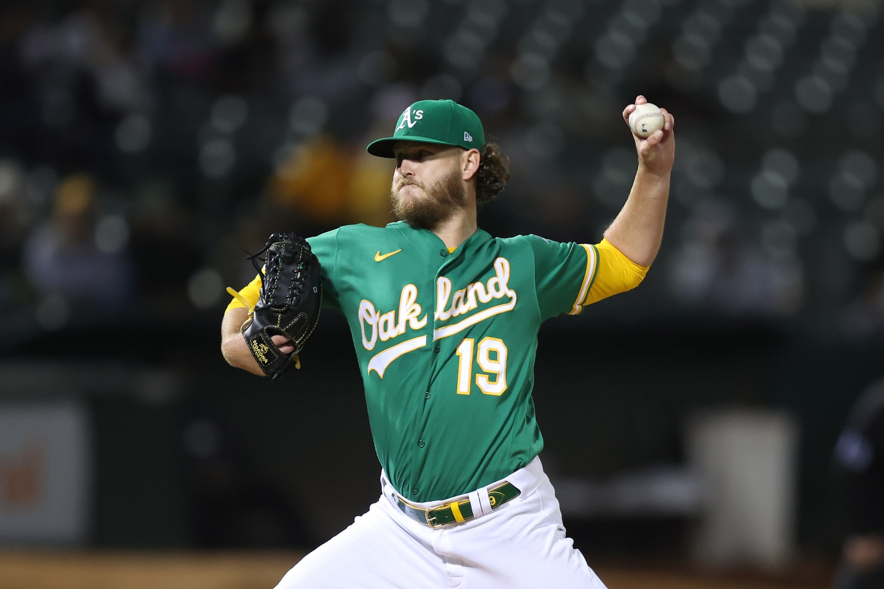 OAKLAND, CALIFORNIA - OCTOBER 04: Cole Irvin #19 of the Oakland Athletics pitches against the Los Angeles Angels at RingCentral Coliseum on October 04, 2022 in Oakland, California. (Photo by Lachlan Cunningham/Getty Images)