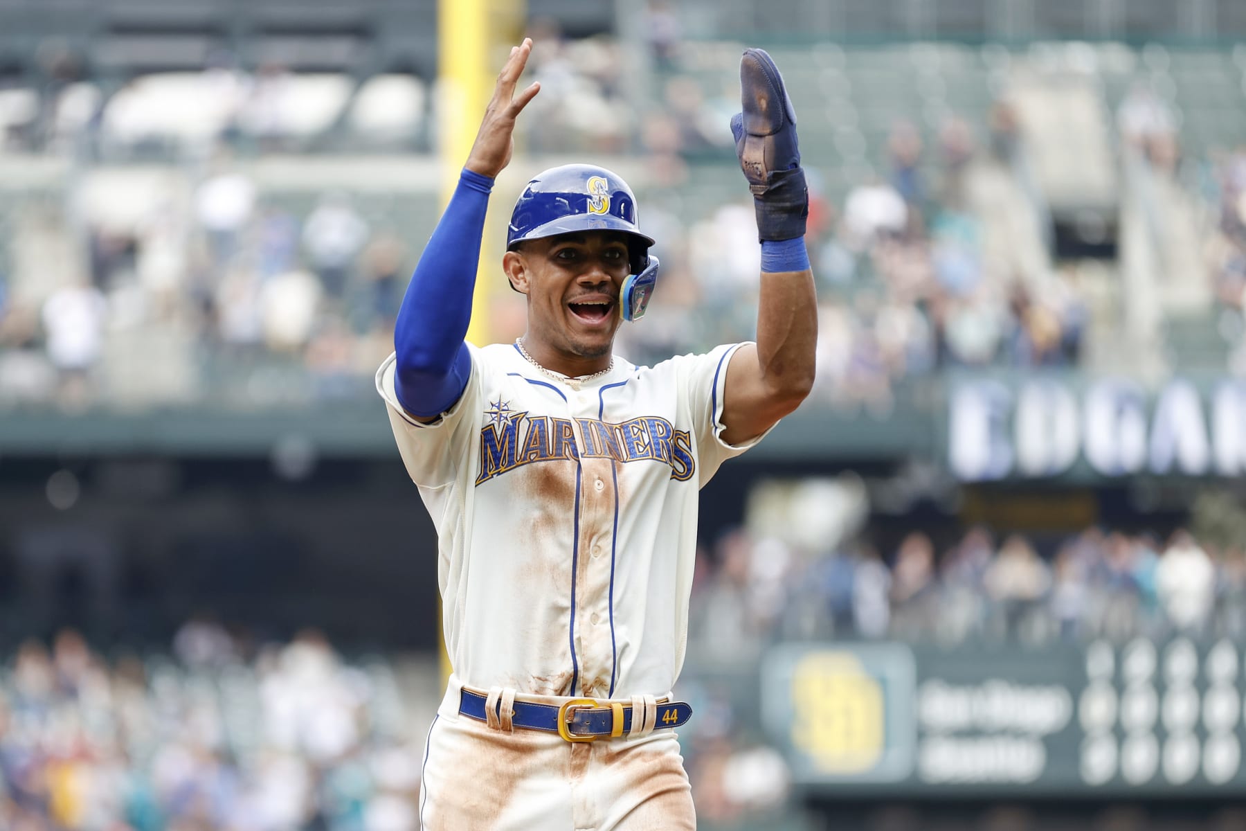 SEATTLE, WASHINGTON - SEPTEMBER 14: Julio Rodriguez #44 of the Seattle Mariners celebrates a three run home run by Carlos Santana #41 during the fifth inning against the San Diego Padres at T-Mobile Park on September 14, 2022 in Seattle, Washington. (Photo by Steph Chambers/Getty Images)