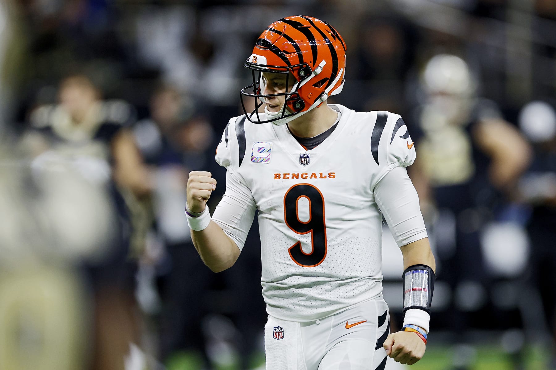 NEW ORLEANS, LOUISIANA - OCTOBER 16: Joe Burrow #9 of the Cincinnati Bengals celebrates after a touchdown pass during the third quarter against the New Orleans Saints at Caesars Superdome on October 16, 2022 in New Orleans, Louisiana. (Photo by Chris Graythen/Getty Images)