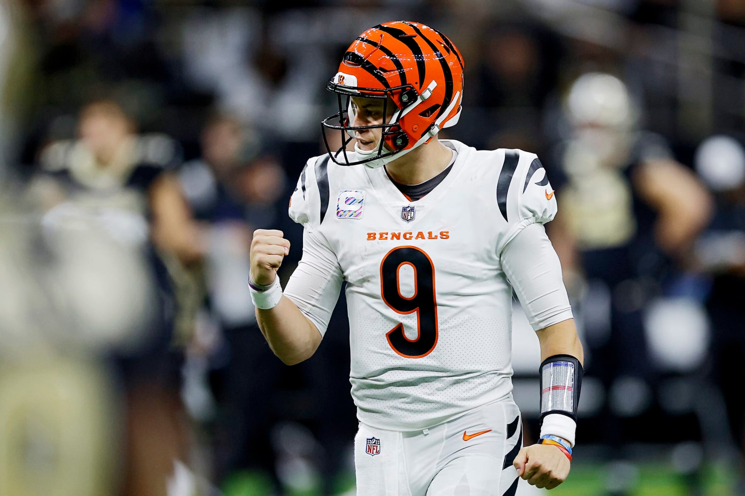 NEW ORLEANS, LOUISIANA - OCTOBER 16: Joe Burrow #9 of the Cincinnati Bengals celebrates after a touchdown pass during the third quarter against the New Orleans Saints at Caesars Superdome on October 16, 2022 in New Orleans, Louisiana. (Photo by Chris Graythen/Getty Images)