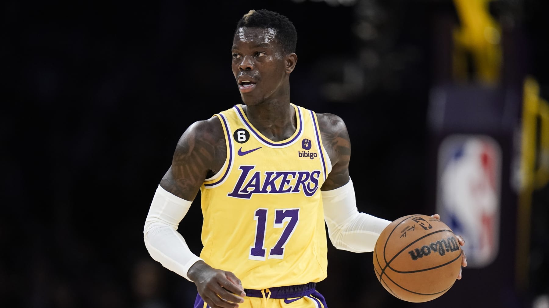 Los Angeles Lakers' Dennis Schroder dribbles the ball during first half of an NBA preseason basketball game against the Minnesota Timberwolves Wednesday, Oct. 12, 2022, in Los Angeles. (AP Photo/Jae C. Hong)