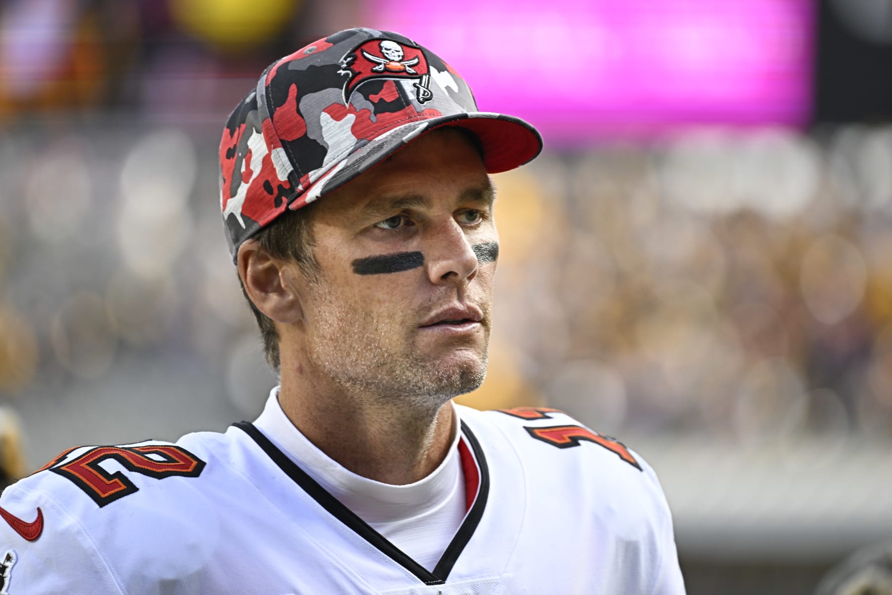 PITTSBURGH, PA - OCTOBER 16:   Tampa Bay Buccaneers quarterback Tom Brady (12) leaves the field looking disappointed after the game between the Tampa Bay Buccaneers and the Pittsburgh Steelers at Acrisure Stadium in Pittsburgh, PA on October 16, 2022.  (Photo by Shelley Lipton/Icon Sportswire via Getty Images)