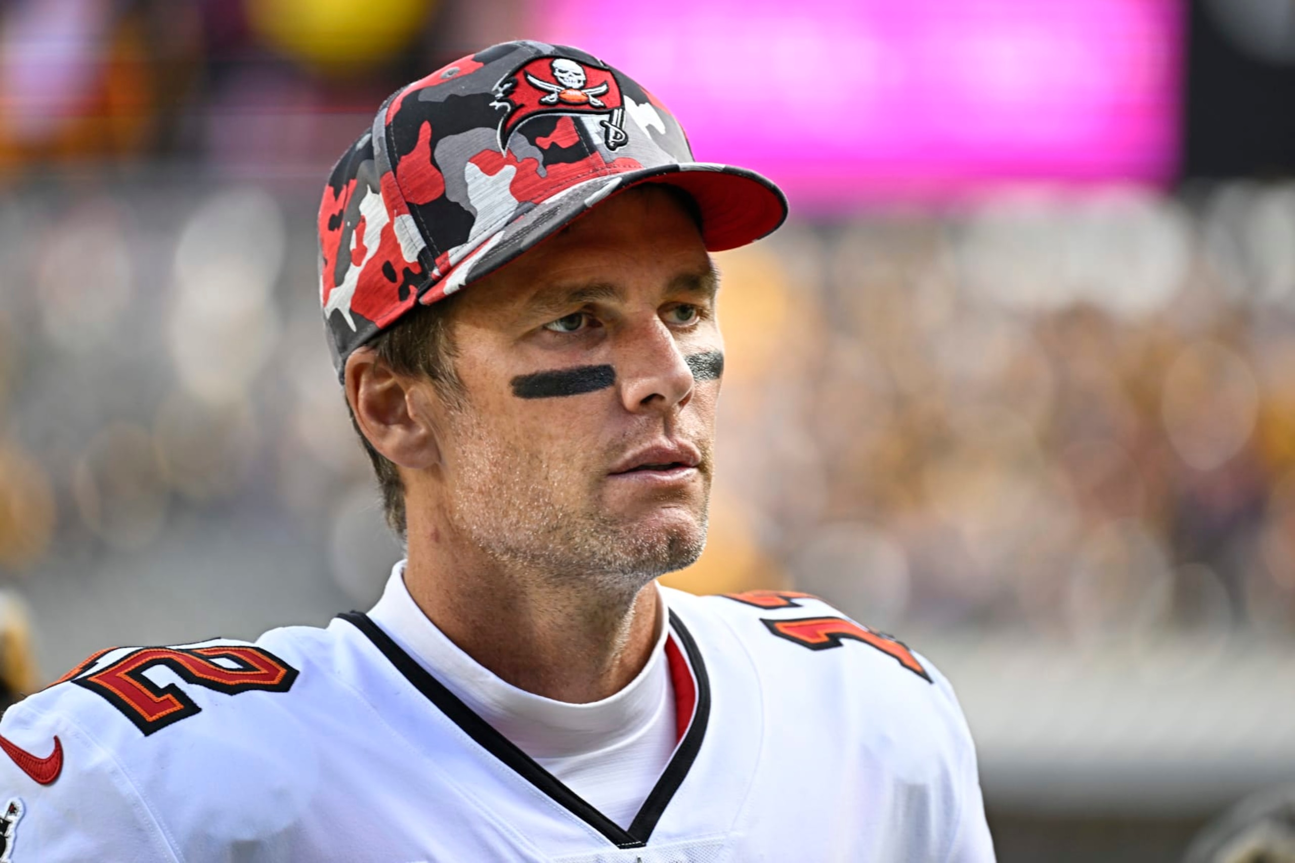 PITTSBURGH, PA - OCTOBER 16:   Tampa Bay Buccaneers quarterback Tom Brady (12) leaves the field looking disappointed after the game between the Tampa Bay Buccaneers and the Pittsburgh Steelers at Acrisure Stadium in Pittsburgh, PA on October 16, 2022.  (Photo by Shelley Lipton/Icon Sportswire via Getty Images)