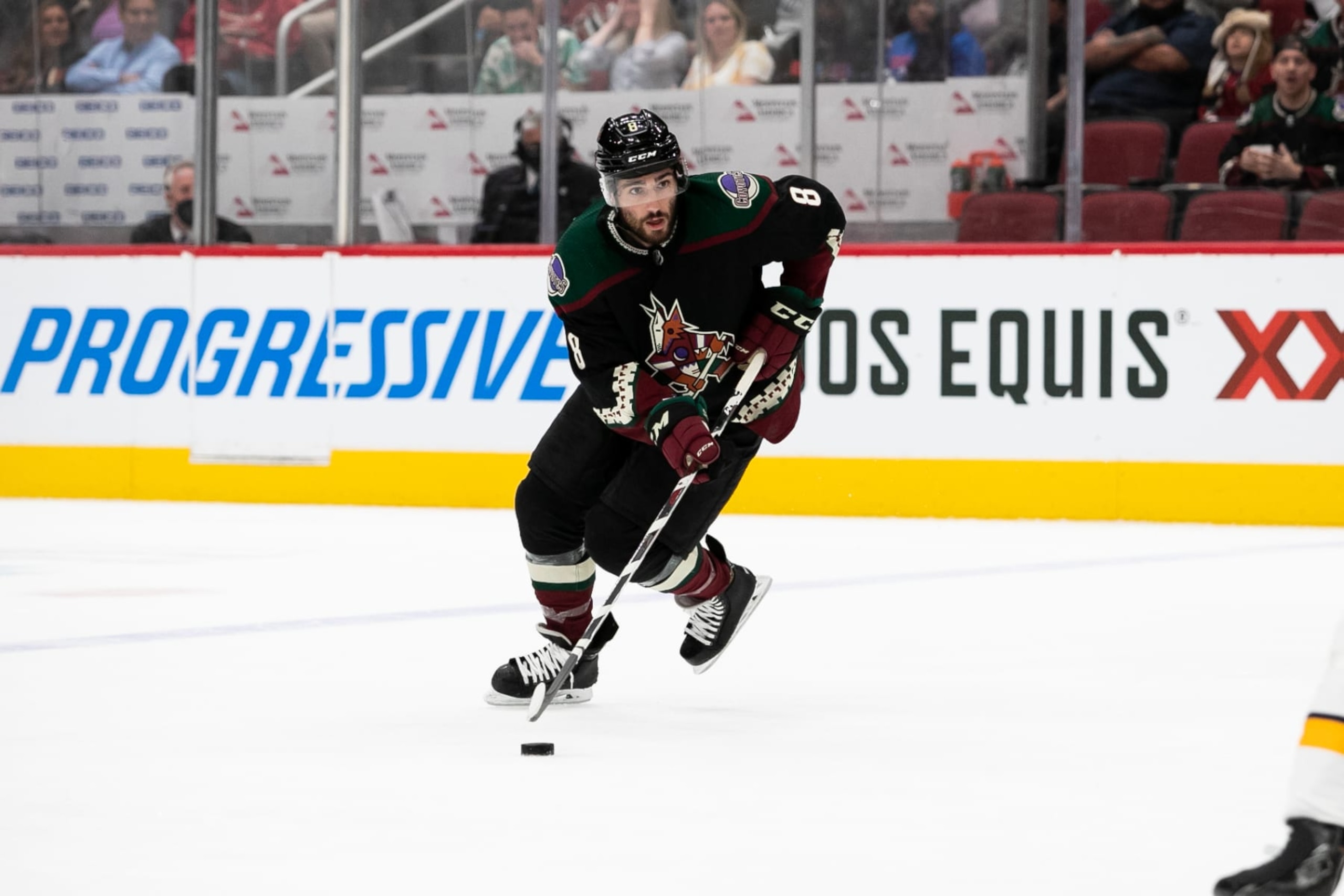 GLENDALE, AZ - APRIL 29: Arizona Coyotes Winger Nick Schmaltz (8) skates with the puck while on the powerpaly during a hockey game between the Nashville Predators and the Arizona Coyotes on April 29, 2022, at Gila River Arena in Glendale, AZ. (Photo by Zac BonDurant/Icon Sportswire via Getty Images)