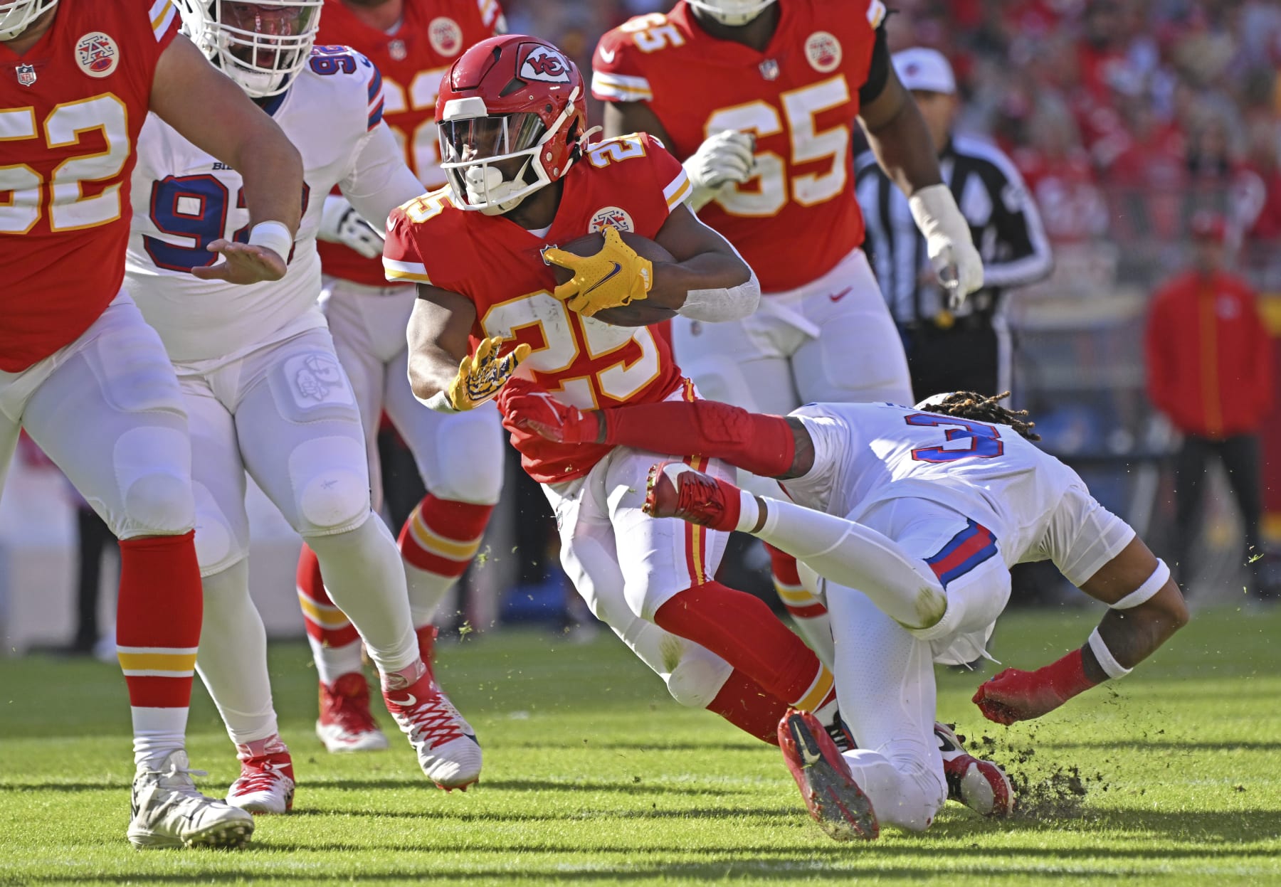 Kansas City Chiefs running back Clyde Edwards-Helaire (25) runs with the ball during an NFL football game against the Buffalo Bills Sunday, Oct. 16, 2022, in Kansas City, Mo. (AP Photo/Peter Aiken)