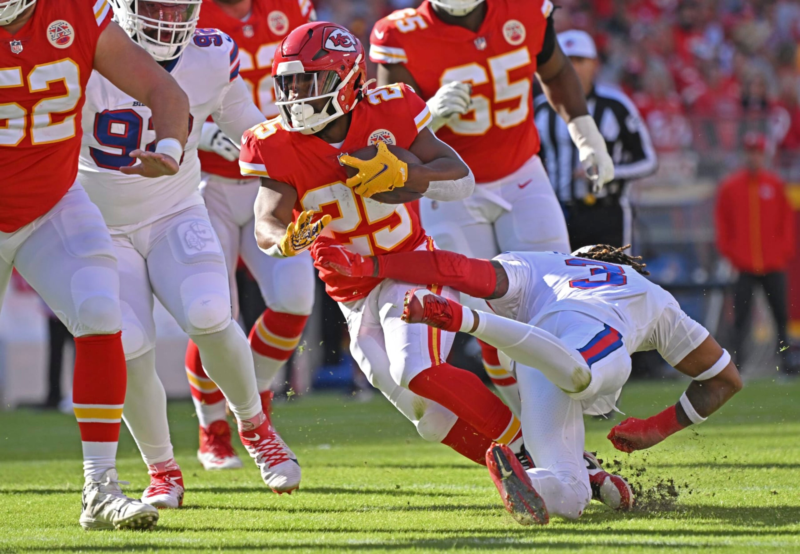 Kansas City Chiefs running back Clyde Edwards-Helaire (25) runs with the ball during an NFL football game against the Buffalo Bills Sunday, Oct. 16, 2022, in Kansas City, Mo. (AP Photo/Peter Aiken)