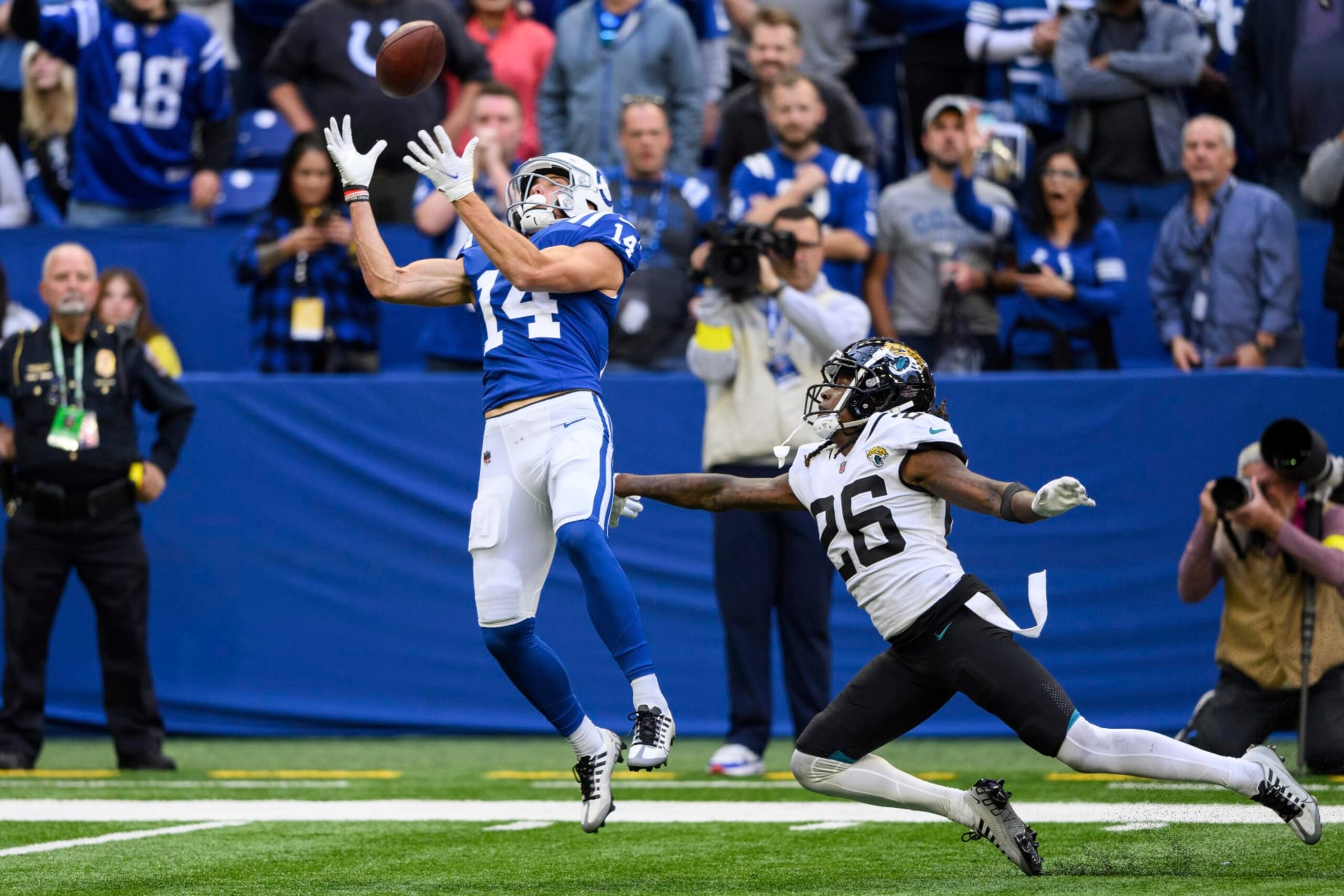 Indianapolis Colts wide receiver Alec Pierce (14) catches the game winning touchdown pass against Jacksonville Jaguars cornerback Shaquill Griffin (26) during an NFL football game, Sunday, Oct. 16, 2022, in Indianapolis. (AP Photo/Zach Bolinger)