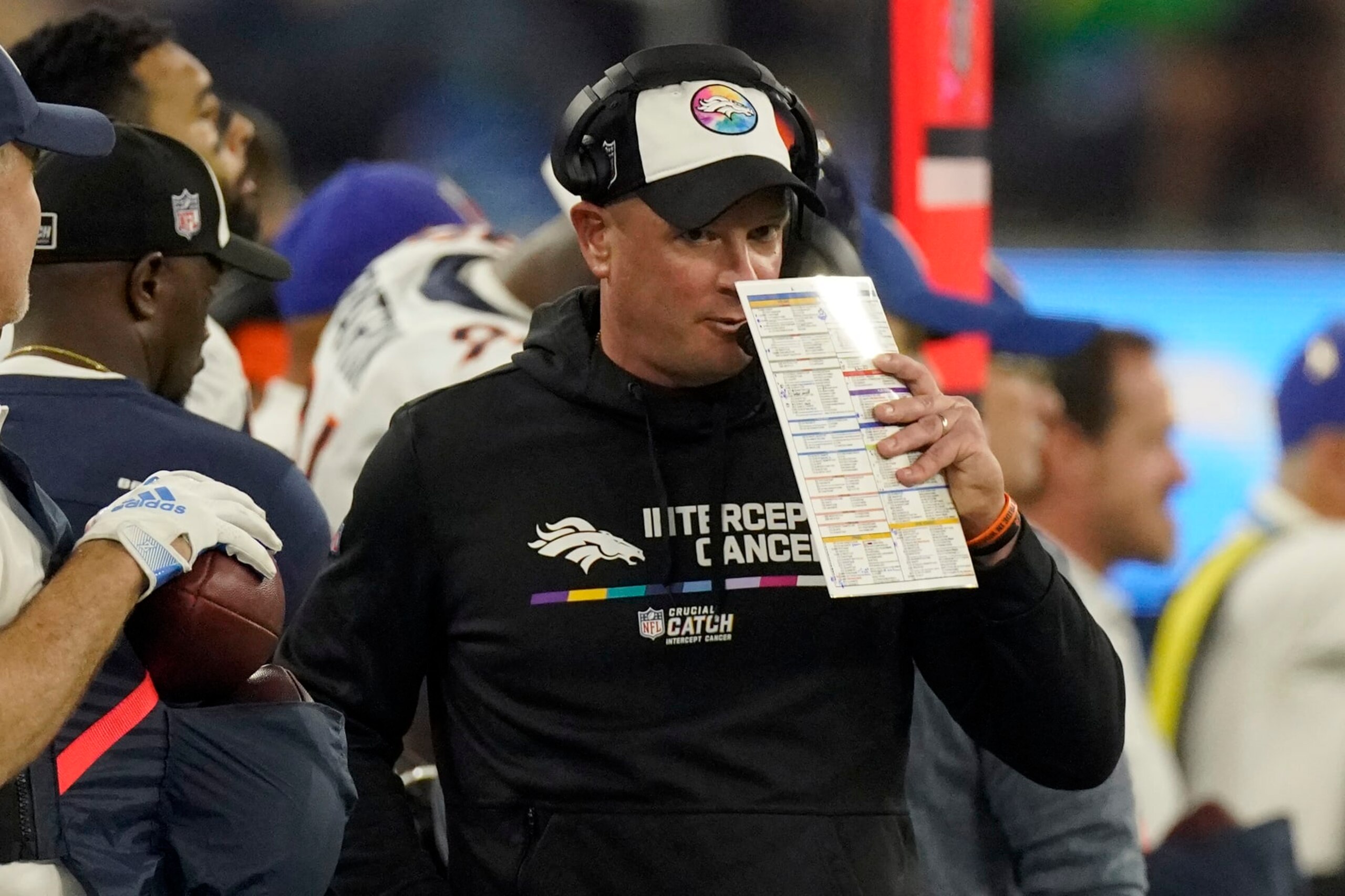Denver Broncos head coach Nathaniel Hackett calls a play against the Los Angeles Chargers during the second half of an NFL football game, Monday, Oct. 17, 2022, in Inglewood, Calif. (AP Photo/Mark J. Terrill)