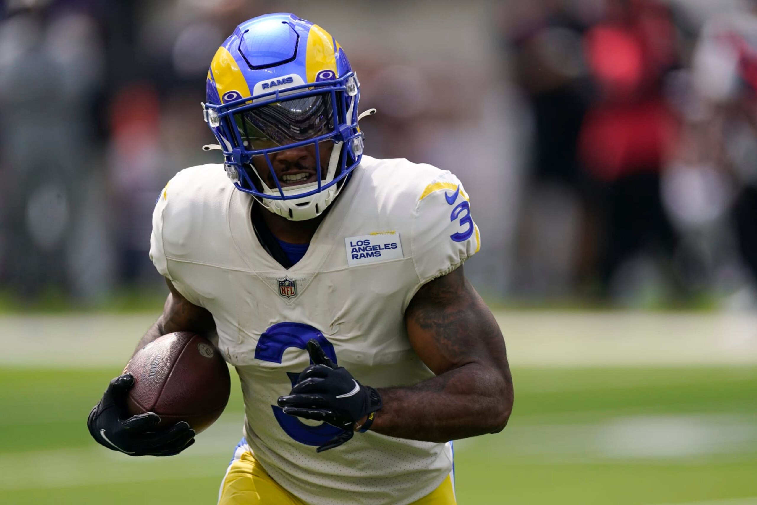 Los Angeles Rams running back Cam Akers runs with the ball during the first half of an NFL football game against the Atlanta Falcons, Sunday, Sept. 18, 2022, in Inglewood, Calif. (AP Photo/Mark J. Terrill)