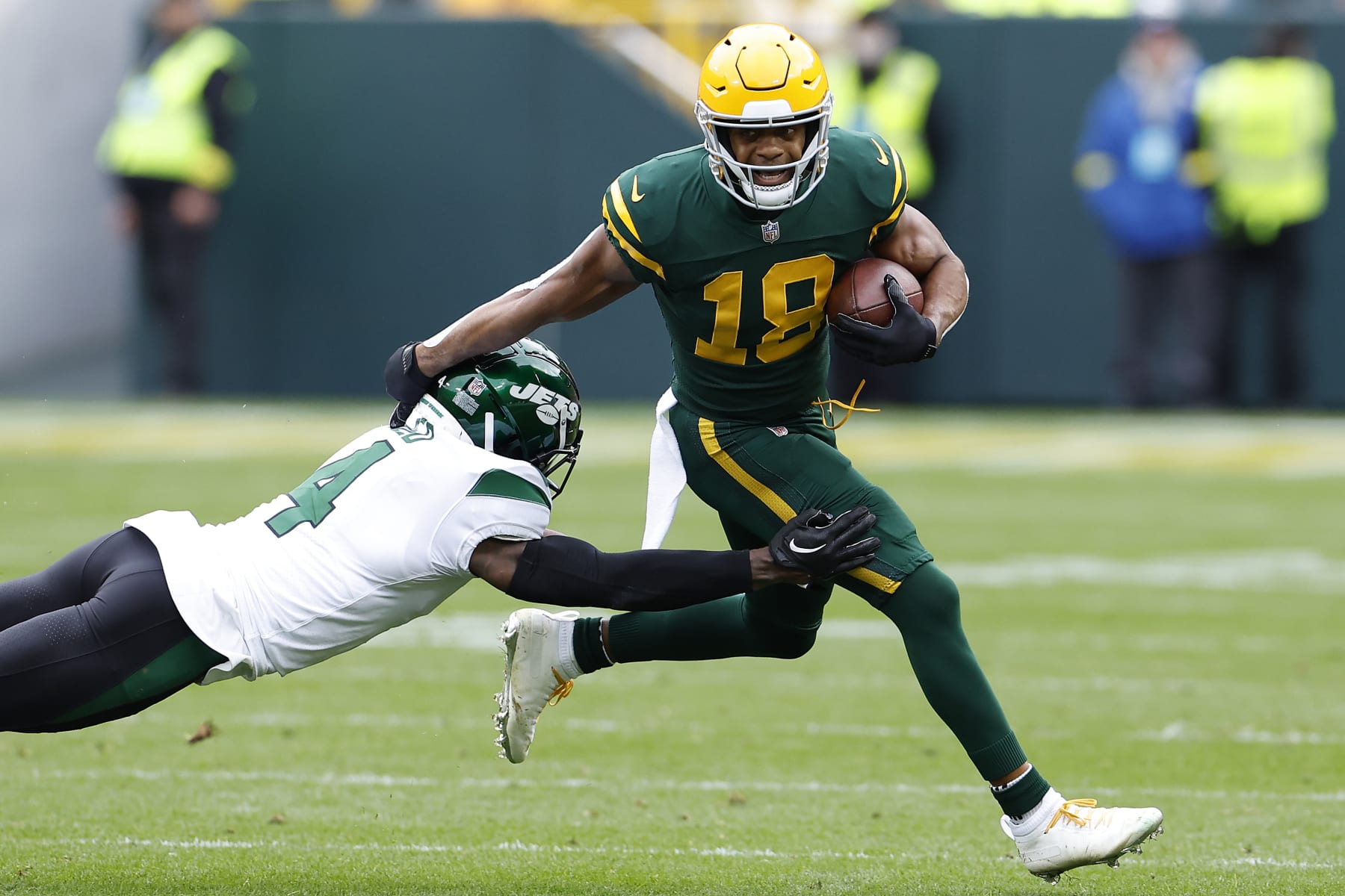 GREEN BAY, WISCONSIN - OCTOBER 16: Randall Cobb #18 of the Green Bay Packers runs for yardage in the second quarter of a game against the New York Jets at Lambeau Field on October 16, 2022 in Green Bay, Wisconsin. (Photo by John Fisher/Getty Images)