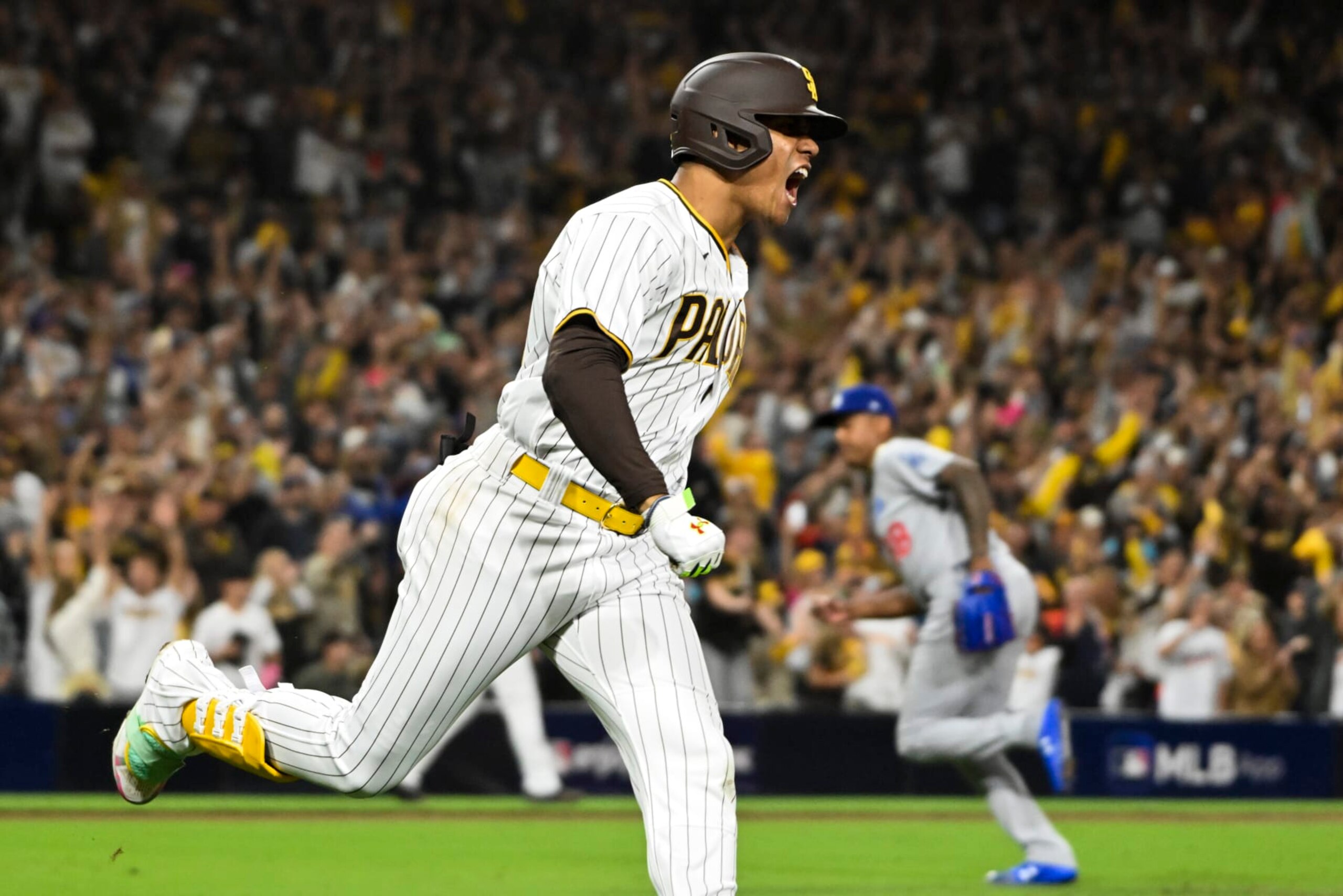 San Diego, CA - October 15: San Diego Padres Juan Soto celebrates after an RBI single to tie the game during the seventh inning in game 4 of the NLDS against the Los Angeles Dodgers at Petco Park on Saturday, Oct. 15, 2022 in San Diego, CA. (Wally Skalij / Los Angeles Times via Getty Images)