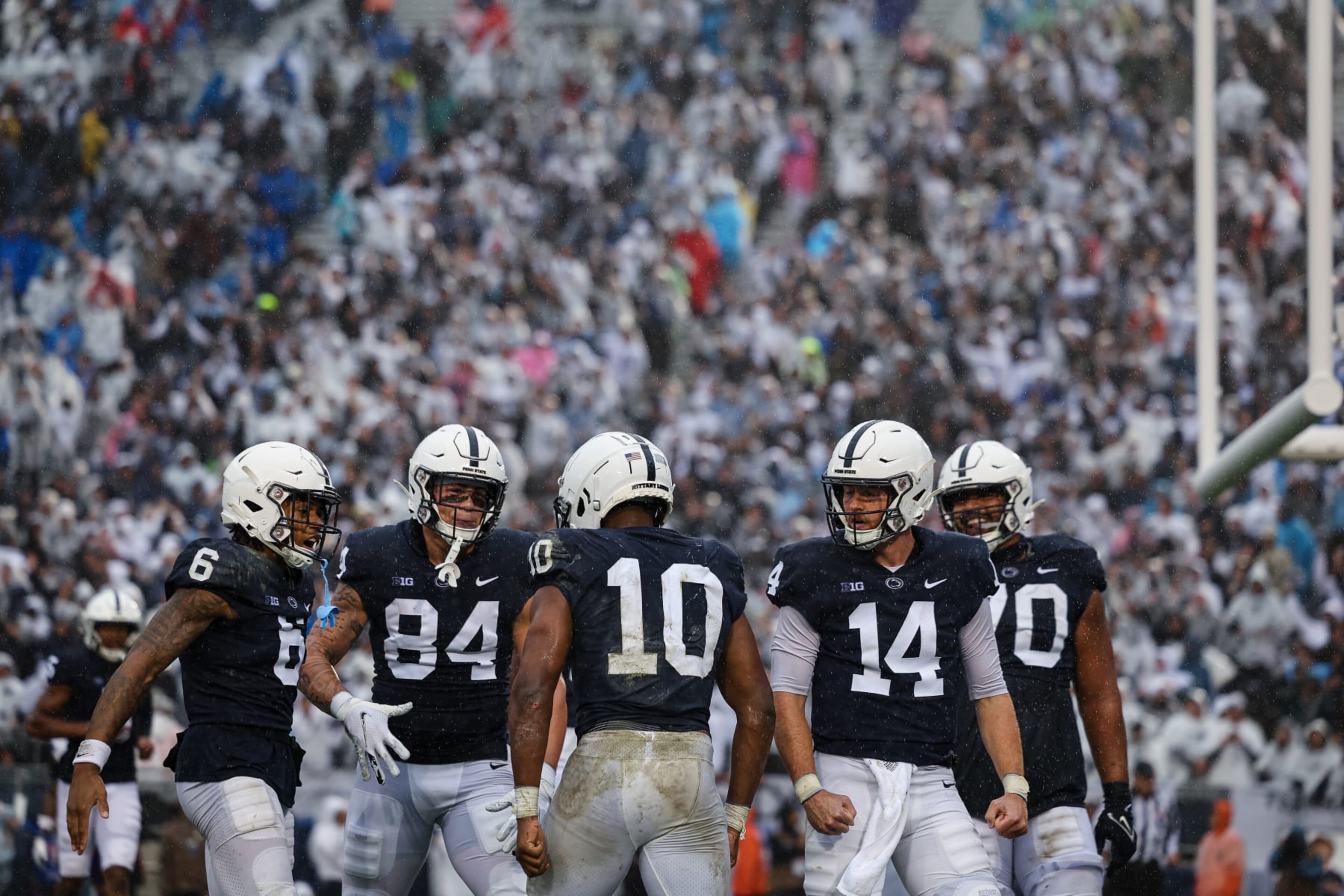 STATE COLLEGE, PA - OCTOBER 01: Nicholas Singleton #10 of the Penn State Nittany Lions celebrates with teammates after scoring a touchdown against the Northwestern Wildcats during the first half at Beaver Stadium on October 1, 2022 in State College, Pennsylvania. (Photo by Scott Taetsch/Getty Images)