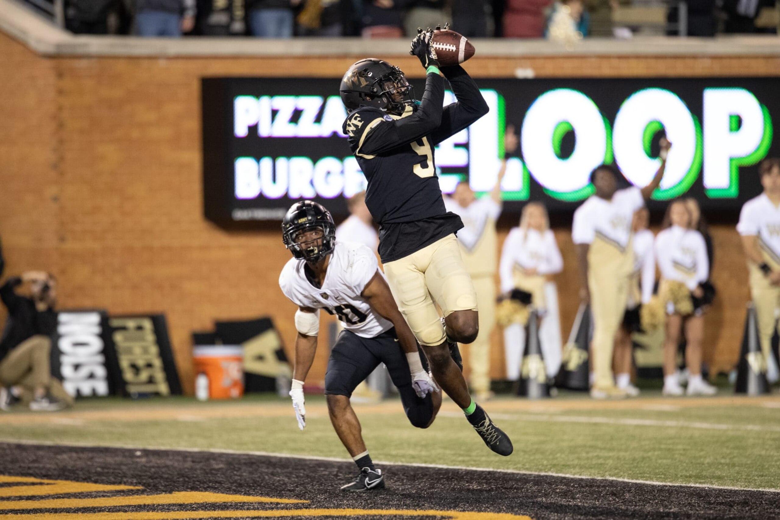 WINSTON-SALEM, NC - OCTOBER 08: Wake Forest Demon Deacons wide receiver A.T. Perry (9) catches a touchdown during a football game between the Army Black Knights  and the Wake Forest Demon Deacons on October 8, 2022, at Truist Field in Winston-Salem, NC. (Photo by Charles Brock/Icon Sportswire via Getty Images)