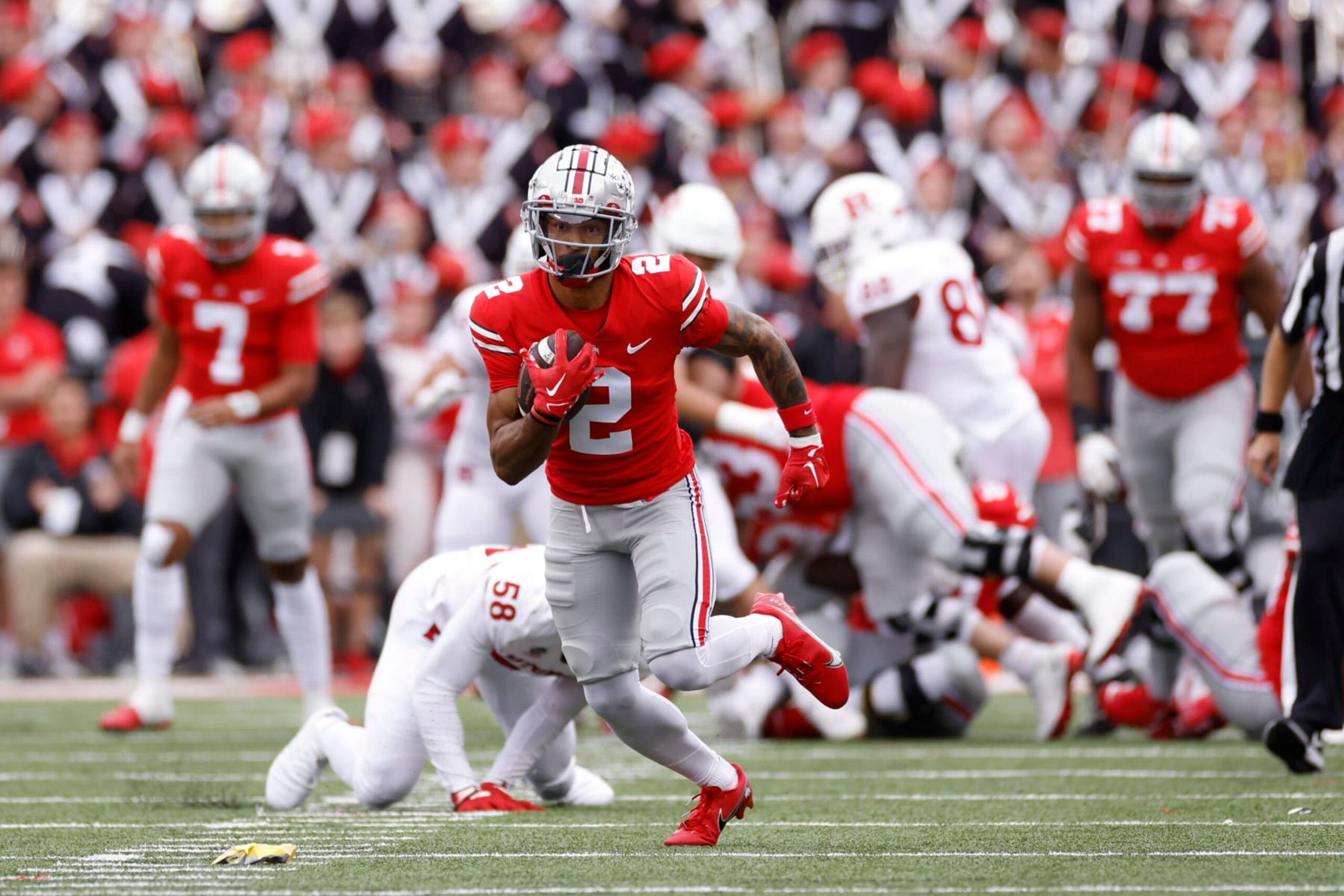 COLUMBUS, OH - OCTOBER 01: Ohio State Buckeyes wide receiver Emeka Egbuka (2) runs with the ball after catching a pass during a college football game against the Rutgers Scarlet Knights on October 1, 2022 at Ohio Stadium in Columbus, Ohio. (Photo by Joe Robbins/Icon Sportswire via Getty Images)