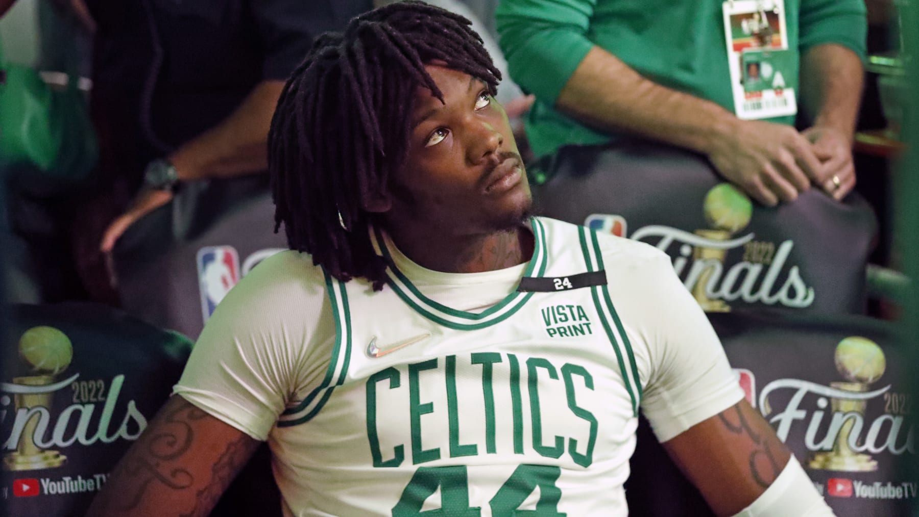 Boston - June 10: The Celtics Robert Williams is pictured on the bench as he watches the start of pre game introductions on the scoreboard. The Boston Celtics host The Golden State Warriors in game 4 of the NBA Finals at TD Garden in Boston on June 10, 2022. (Photo by Jim Davis/The Boston Globe via Getty Images)