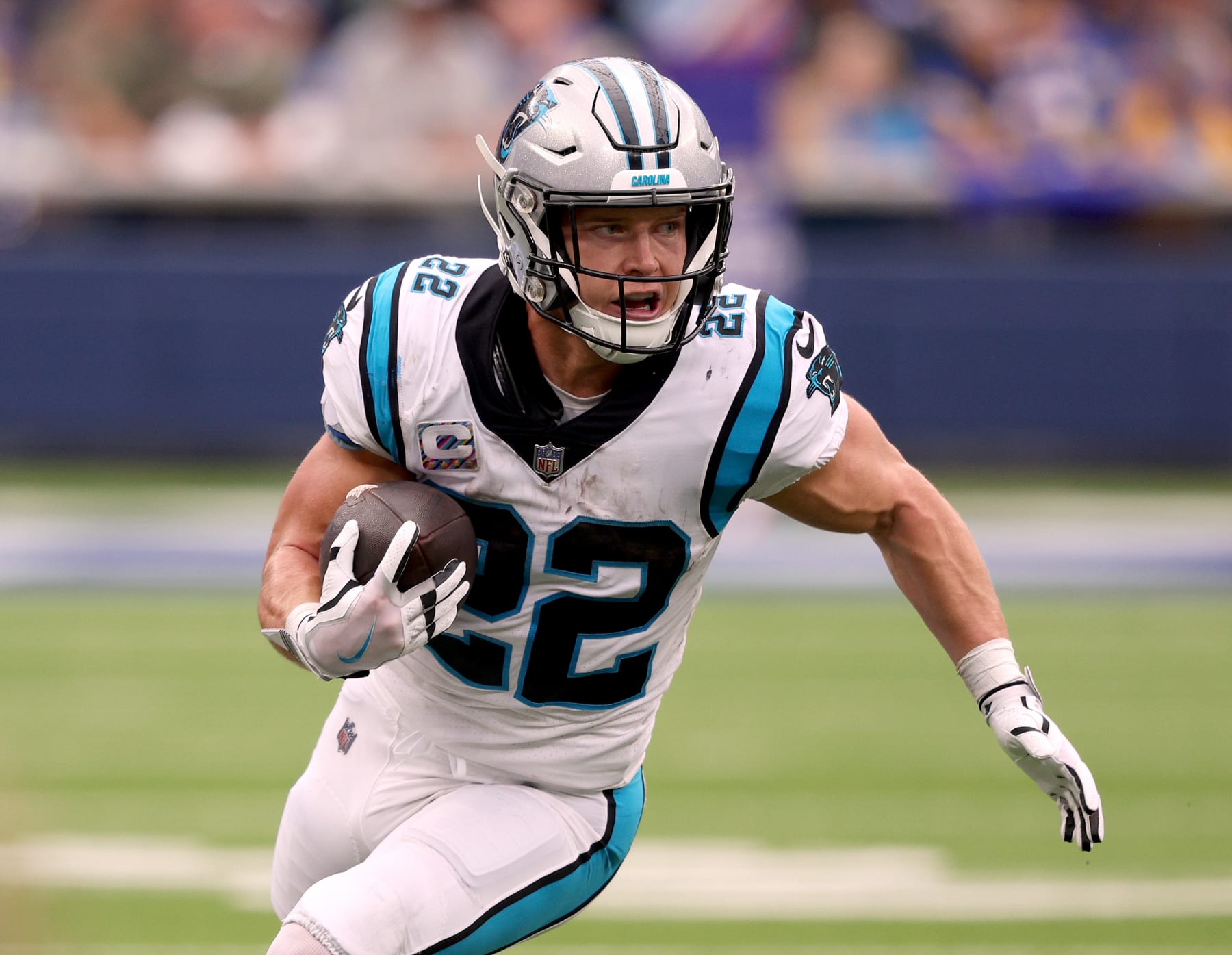 INGLEWOOD, CALIFORNIA - OCTOBER 16: Christian McCaffrey #22 of the Carolina Panthers runs after his catch during a 24-10 loss to the Los Angeles Rams at SoFi Stadium on October 16, 2022 in Inglewood, California. (Photo by Harry How/Getty Images)