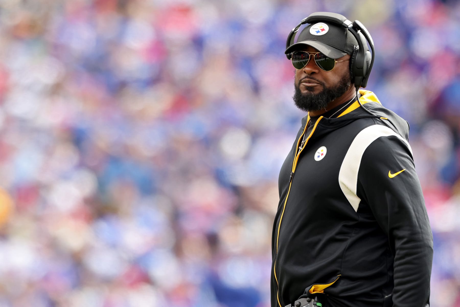 ORCHARD PARK, NEW YORK - OCTOBER 09:Head coach Mike Tomlin of the Pittsburgh Steelers  looks on against the Buffalo Bills during the first quarter at Highmark Stadium on October 09, 2022 in Orchard Park, New York. (Photo by Bryan M. Bennett/Getty Images)