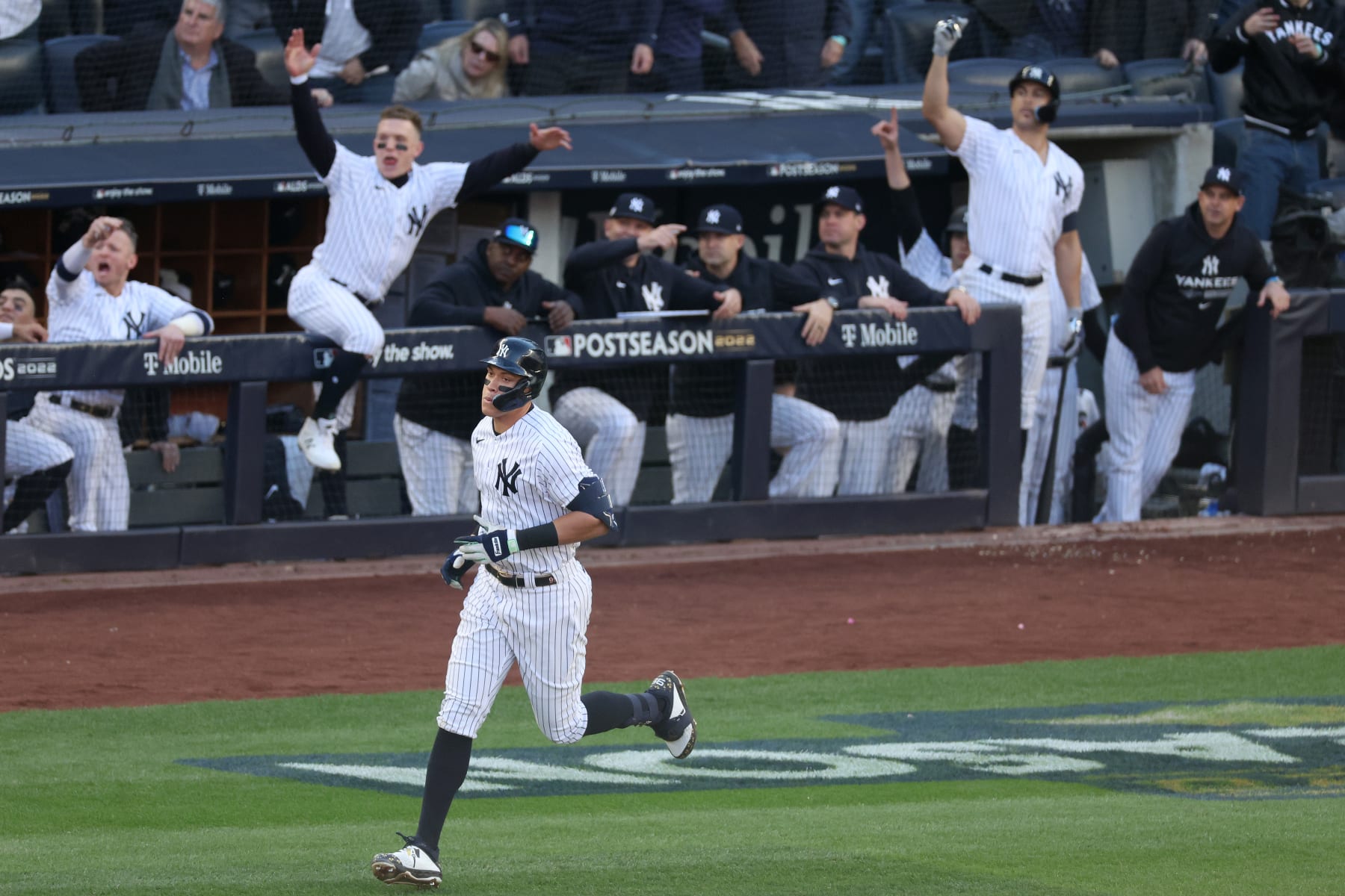 NEW YORK, NEW YORK - OCTOBER 18: Aaron Judge #99 of the New York Yankees hits a home run against the Cleveland Guardians during the second inning in game five of the American League Division Series at Yankee Stadium on October 18, 2022 in New York, New York. (Photo by Al Bello/Getty Images)