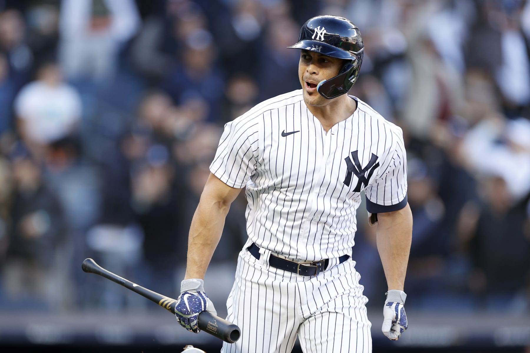 NEW YORK, NEW YORK - OCTOBER 18: Giancarlo Stanton #27 of the New York Yankees reacts after hitting a three-run home run against the Cleveland Guardians during the first inning in game five of the American League Division Series at Yankee Stadium on October 18, 2022 in New York, New York. (Photo by Sarah Stier/Getty Images)