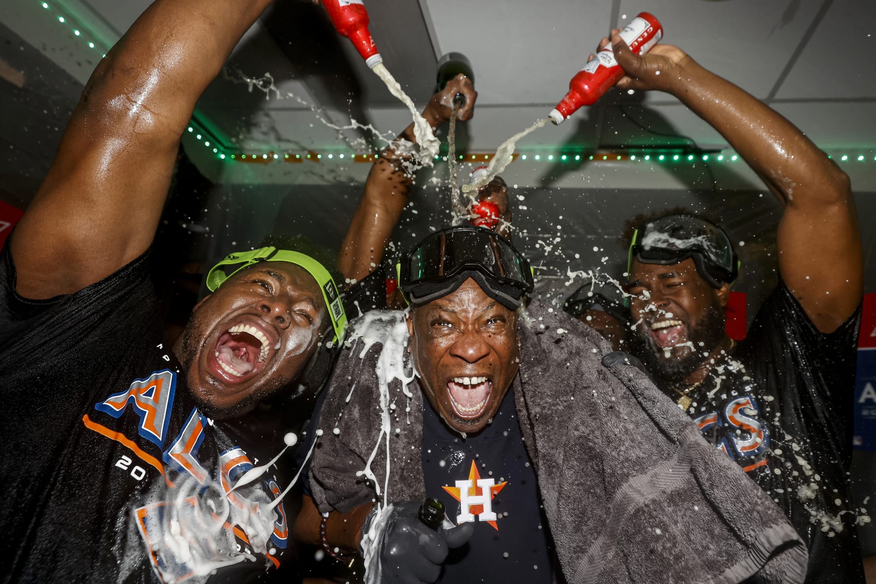 SEATTLE, WASHINGTON - OCTOBER 15: Dusty Baker Jr. #12 of the Houston Astros celebrates alongside Bryan Abreu #52 after defeating the Seattle Mariners 1-0 in game three of the American League Division Series at T-Mobile Park on October 15, 2022 in Seattle, Washington. (Photo by Steph Chambers/Getty Images)