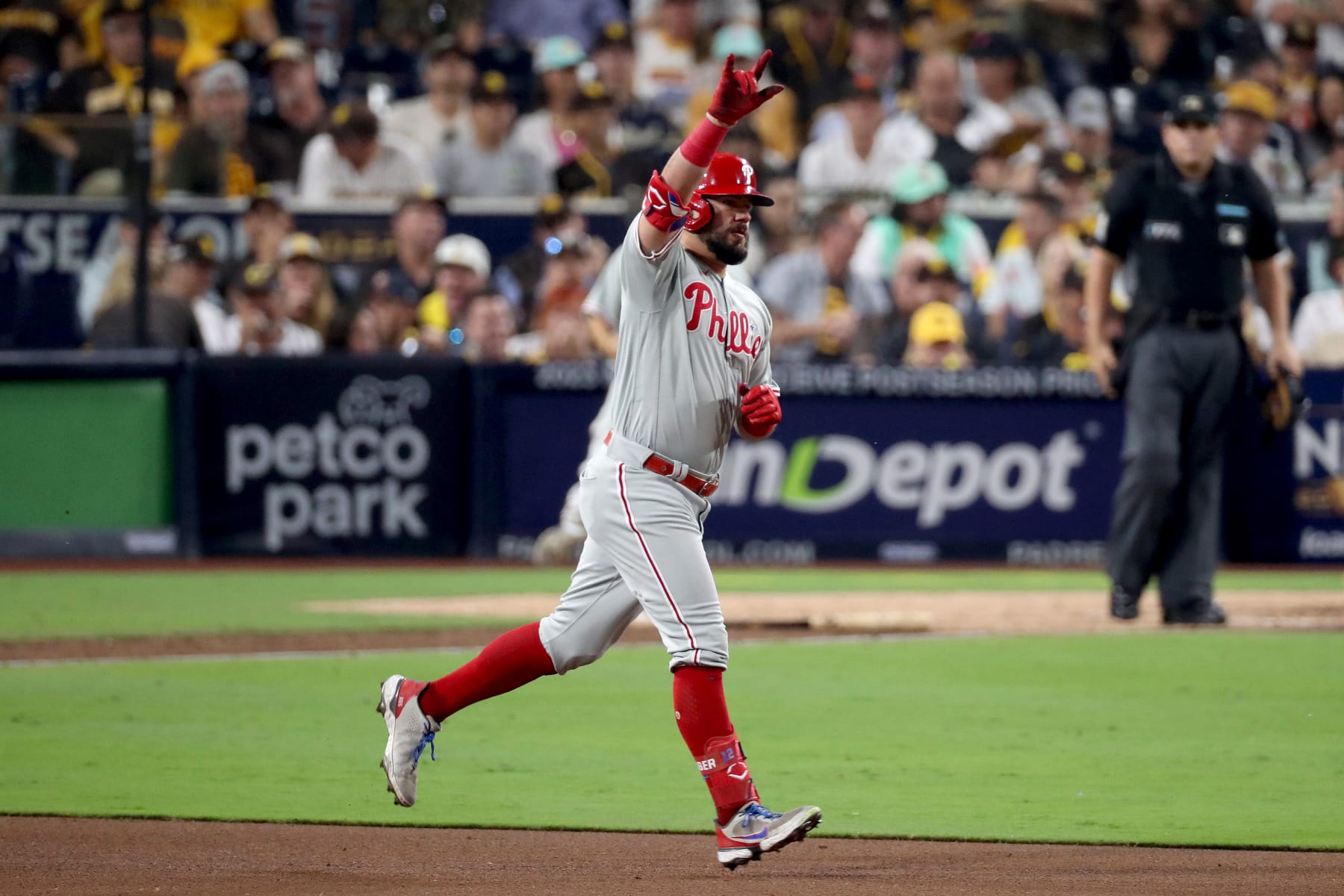 SAN DIEGO, CALIFORNIA - OCTOBER 18: Kyle Schwarber #12 of the Philadelphia Phillies reacts after hitting a home run during the sixth inning against the San Diego Padres in game one of the National League Championship Series at PETCO Park on October 18, 2022 in San Diego, California. (Photo by Denis Poroy/Getty Images)