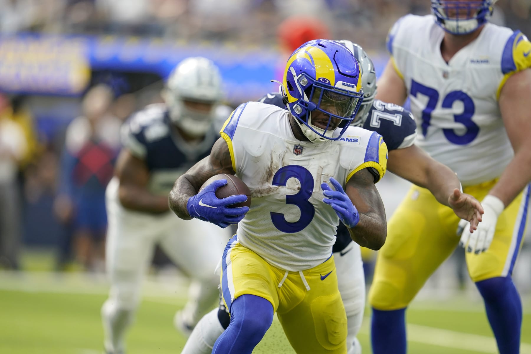 Los Angeles Rams' Cam Akers (3) carries the ball in the first half of an NFL football game against the Dallas Cowboys, Sunday, Oct. 9, 2022, in Inglewood, Calif. (AP Photo/Marcio Jose Sanchez)