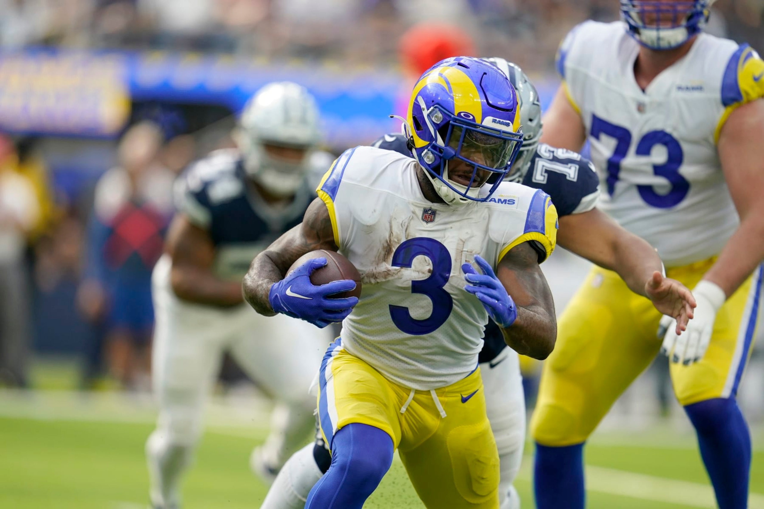 Los Angeles Rams' Cam Akers (3) carries the ball in the first half of an NFL football game against the Dallas Cowboys, Sunday, Oct. 9, 2022, in Inglewood, Calif. (AP Photo/Marcio Jose Sanchez)