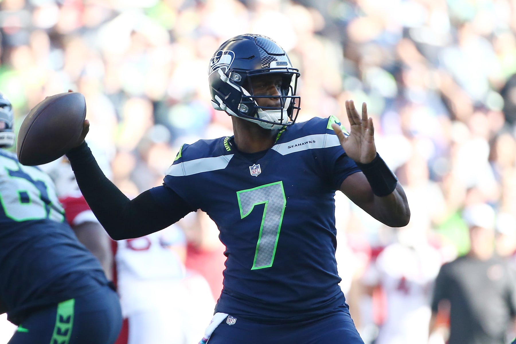SEATTLE, WASHINGTON - OCTOBER 16: Geno Smith #7 of the Seattle Seahawks passes against the Arizona Cardinals during the third quarter at Lumen Field on October 16, 2022 in Seattle, Washington. (Photo by Lindsey Wasson/Getty Images)