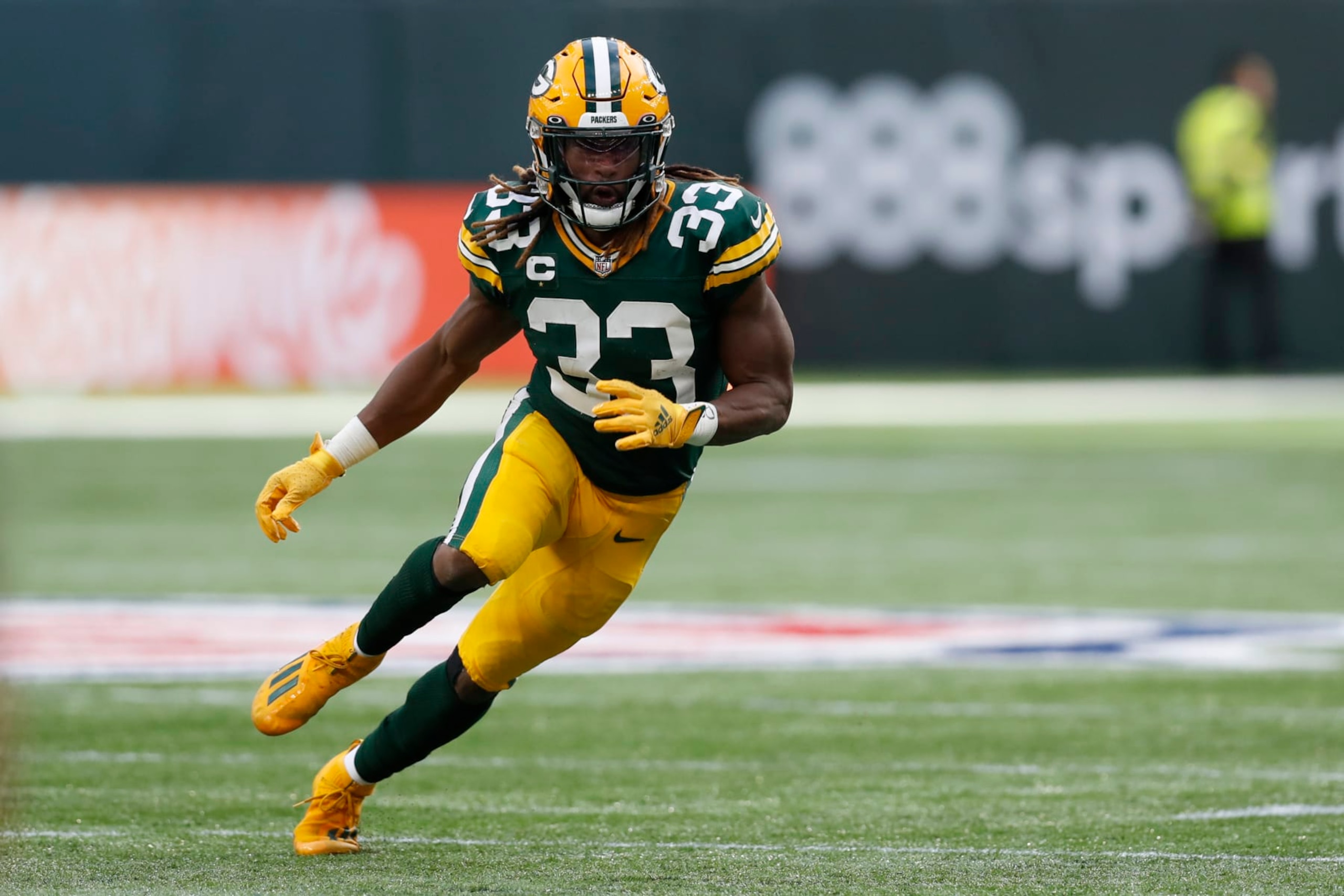 Green Bay Packers running back Aaron Jones (33) in action during an NFL football game against the New York Giants at Tottenham Hotspur Stadium in London, Sunday, Oct. 9, 2022. (AP Photo/Steve Luciano)