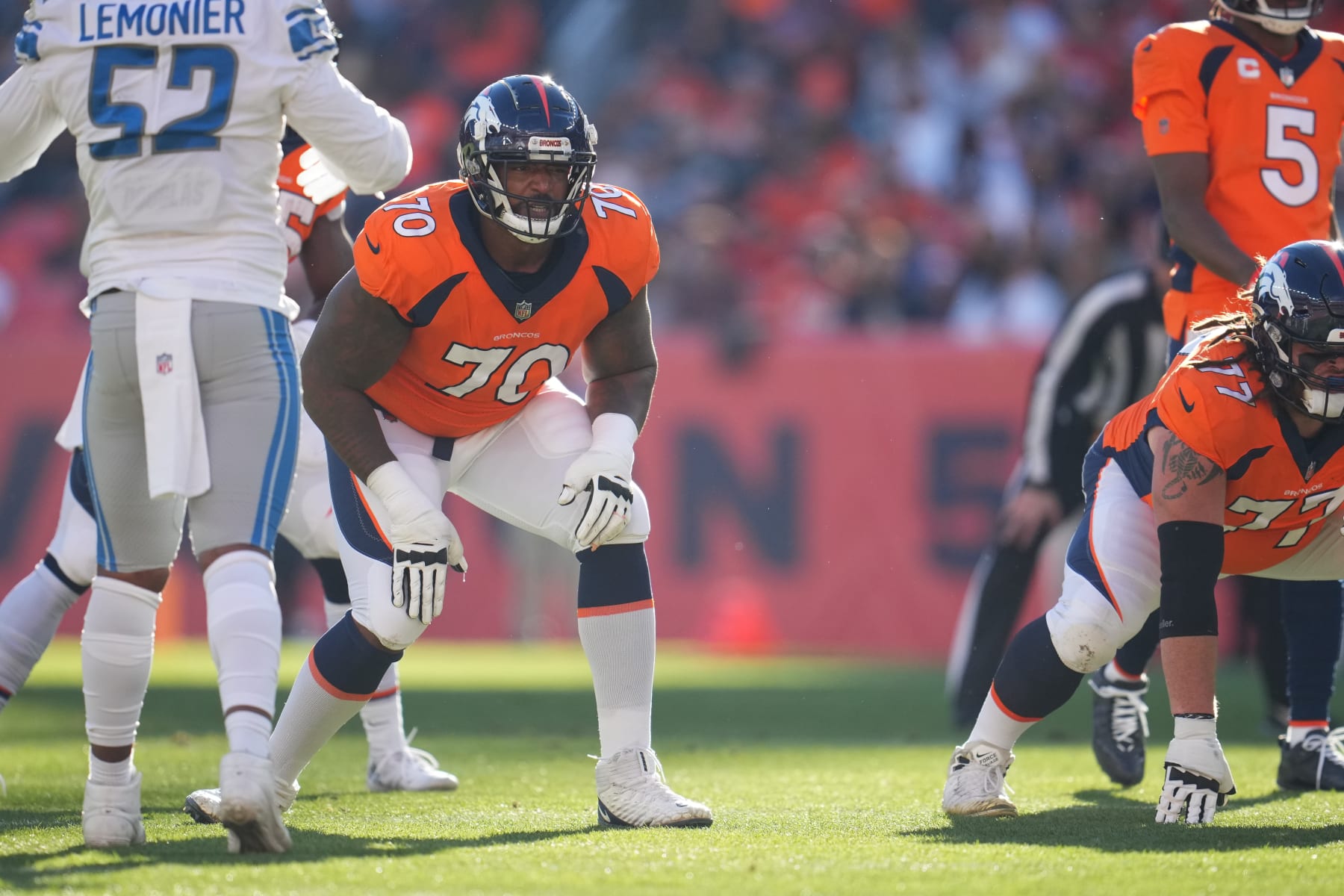 DENVER, COLORADO - DECEMBER 12: Bobby Massie #70 of the Denver Broncos gets set against the Detroit Lions during an NFL game at Empower Field At Mile High on December 12, 2021 in Denver, Colorado. (Photo by Cooper Neill/Getty Images)