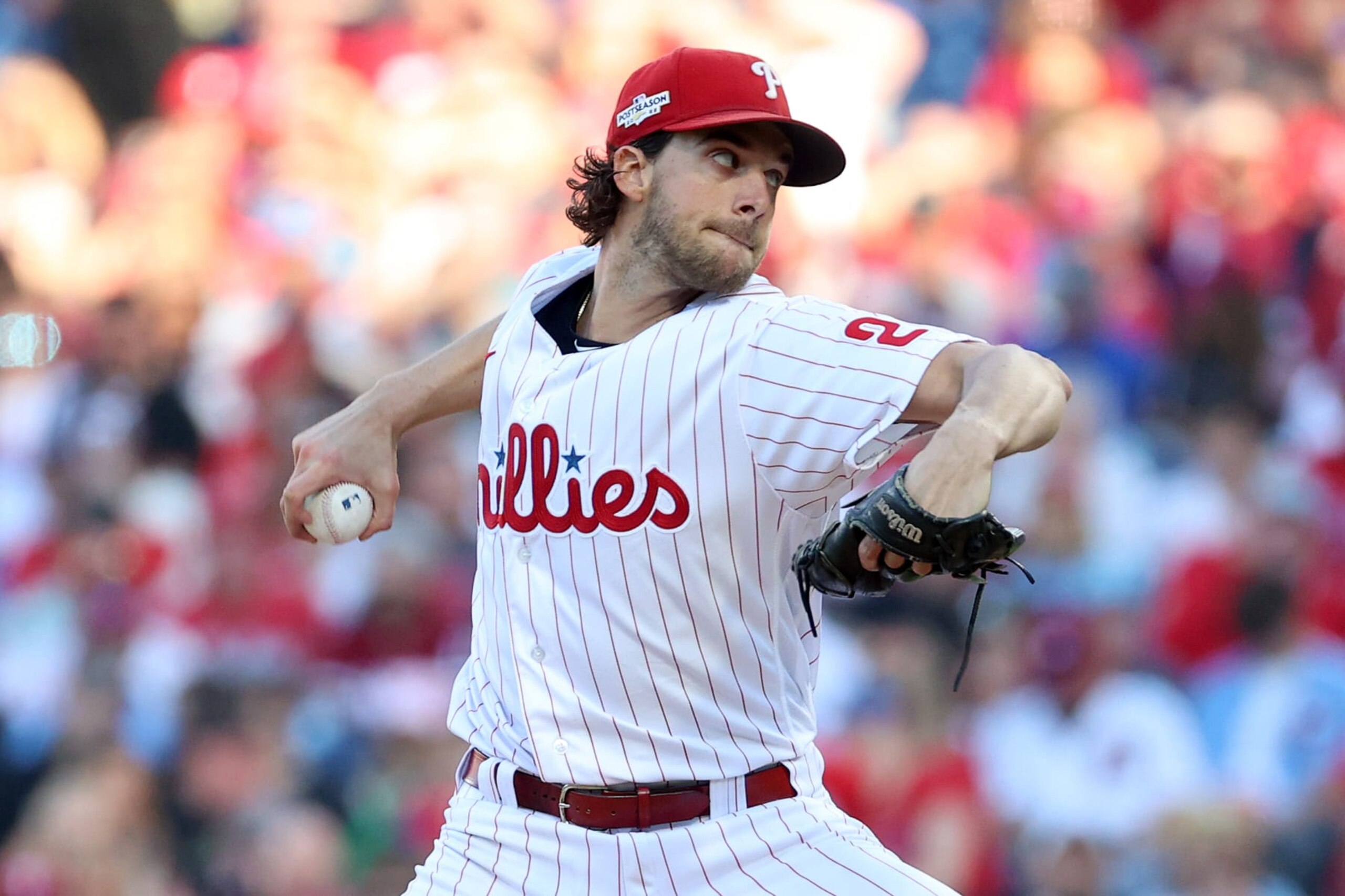 PHILADELPHIA, PENNSYLVANIA - OCTOBER 14: Aaron Nola #27 of the Philadelphia Phillies throws a pitch against the Atlanta Braves during the second inning in game three of the National League Division Series at Citizens Bank Park on October 14, 2022 in Philadelphia, Pennsylvania. (Photo by Tim Nwachukwu/Getty Images)