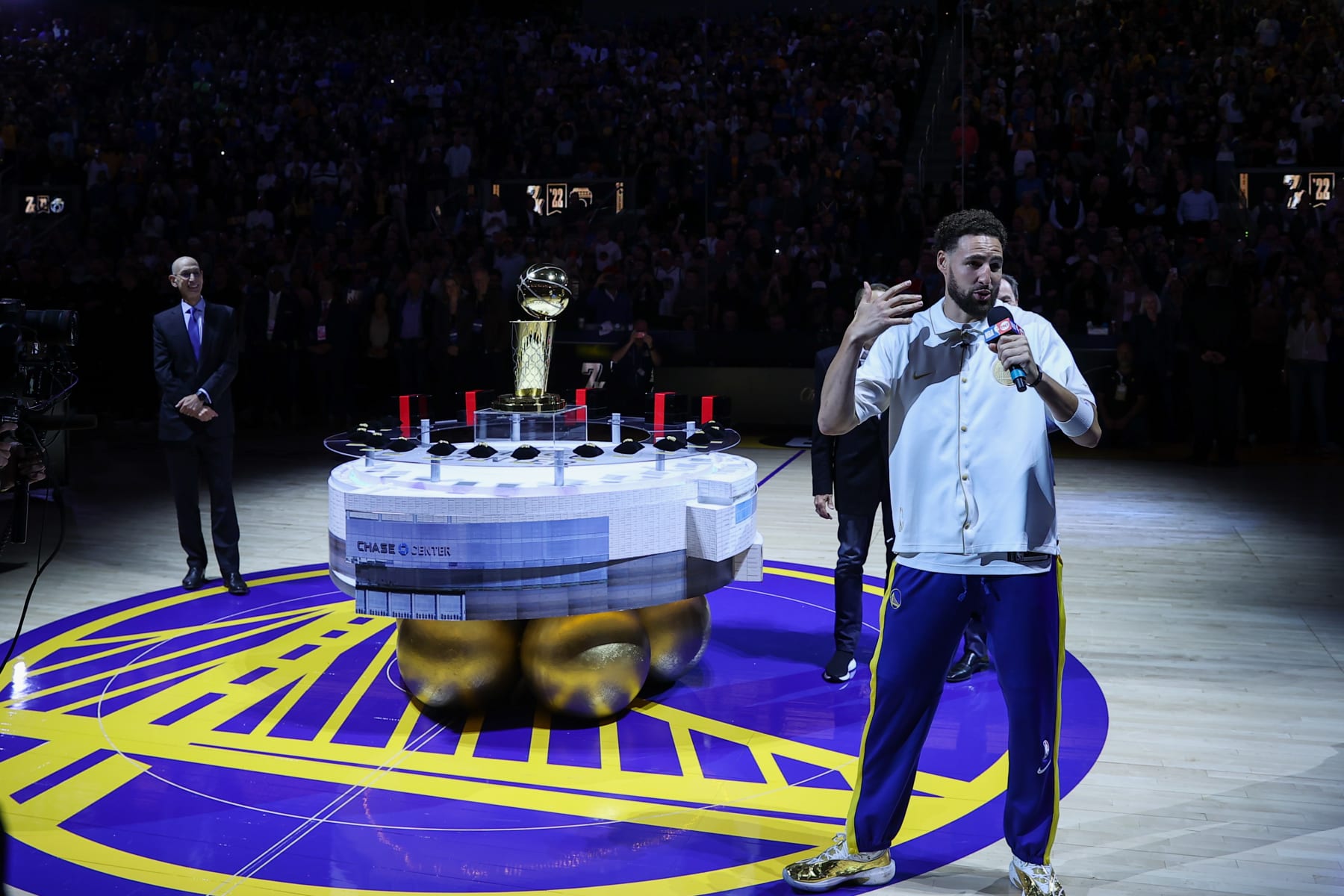 SAN FRANCISCO, CA - OCTOBER 18: Klay Thompson of Golden State Warriors speaks as Commissioner of the NBA, Adam Silver (L) attends the Champions Ring Night Ceremony before NBA game between Golden State Warriors and Los Angeles Lakers at the Chase Center on October 18, 2022 in San Francisco, California, United States. (Photo by Tayfun Coskun/Anadolu Agency via Getty Images)