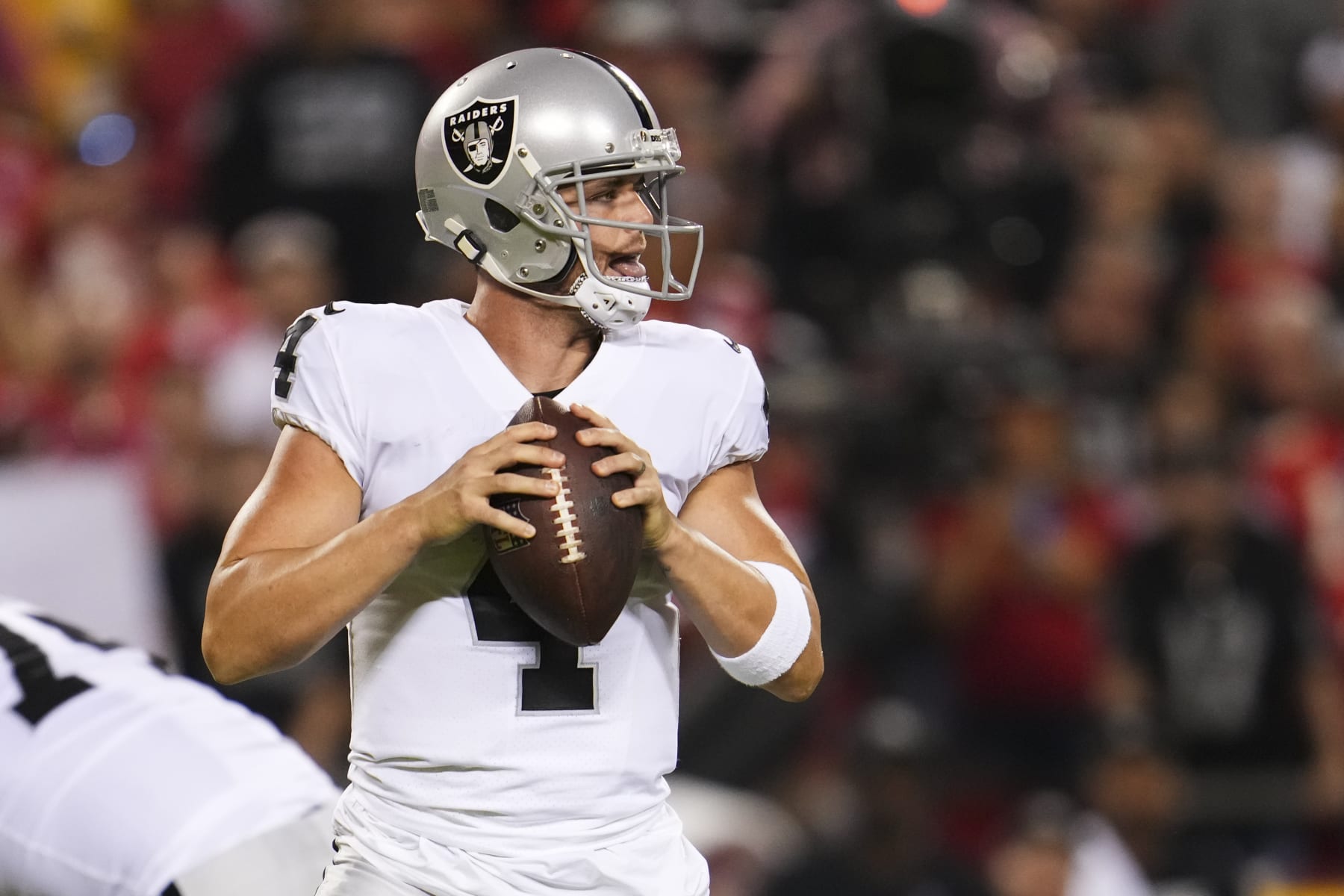 KANSAS CITY, MO - OCTOBER 10: Derek Carr #4 of the Las Vegas Raiders looks to pass against the Kansas City Chiefs at GEHA Field at Arrowhead Stadium on October 10, 2022 in Kansas City, Missouri. (Photo by Cooper Neill/Getty Images)