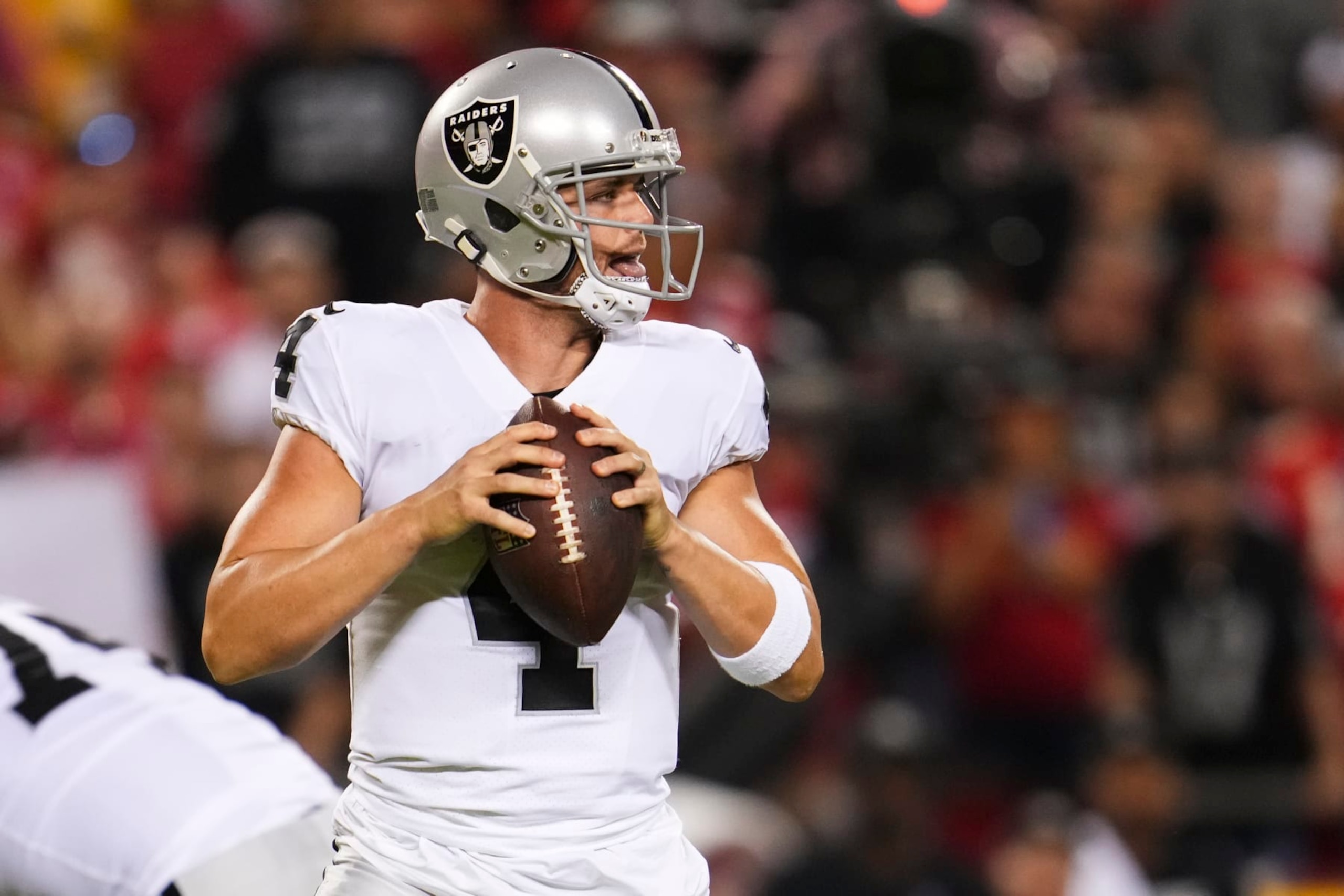 KANSAS CITY, MO - OCTOBER 10: Derek Carr #4 of the Las Vegas Raiders looks to pass against the Kansas City Chiefs at GEHA Field at Arrowhead Stadium on October 10, 2022 in Kansas City, Missouri. (Photo by Cooper Neill/Getty Images)