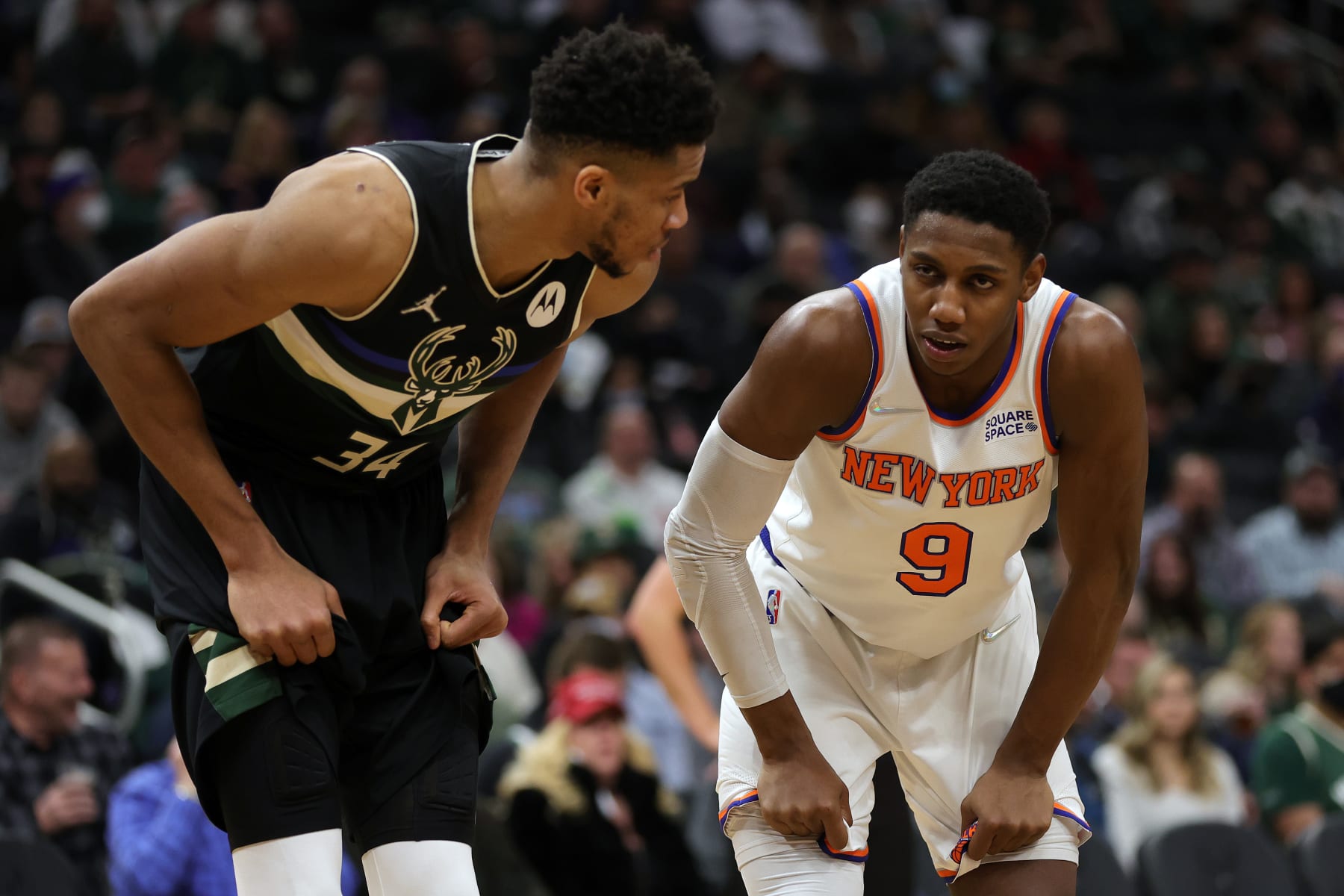 MILWAUKEE, WISCONSIN - JANUARY 28: Giannis Antetokounmpo #34 of the Milwaukee Bucks and RJ Barrett #9 of the New York Knicks talk during a free throw attempt in the third quarter at Fiserv Forum on January 28, 2022 in Milwaukee, Wisconsin. NOTE TO USER: User expressly acknowledges and agrees that, by downloading and or using this photograph, User is consenting to the terms and conditions of the Getty Images License Agreement. (Photo by Stacy Revere/Getty Images)