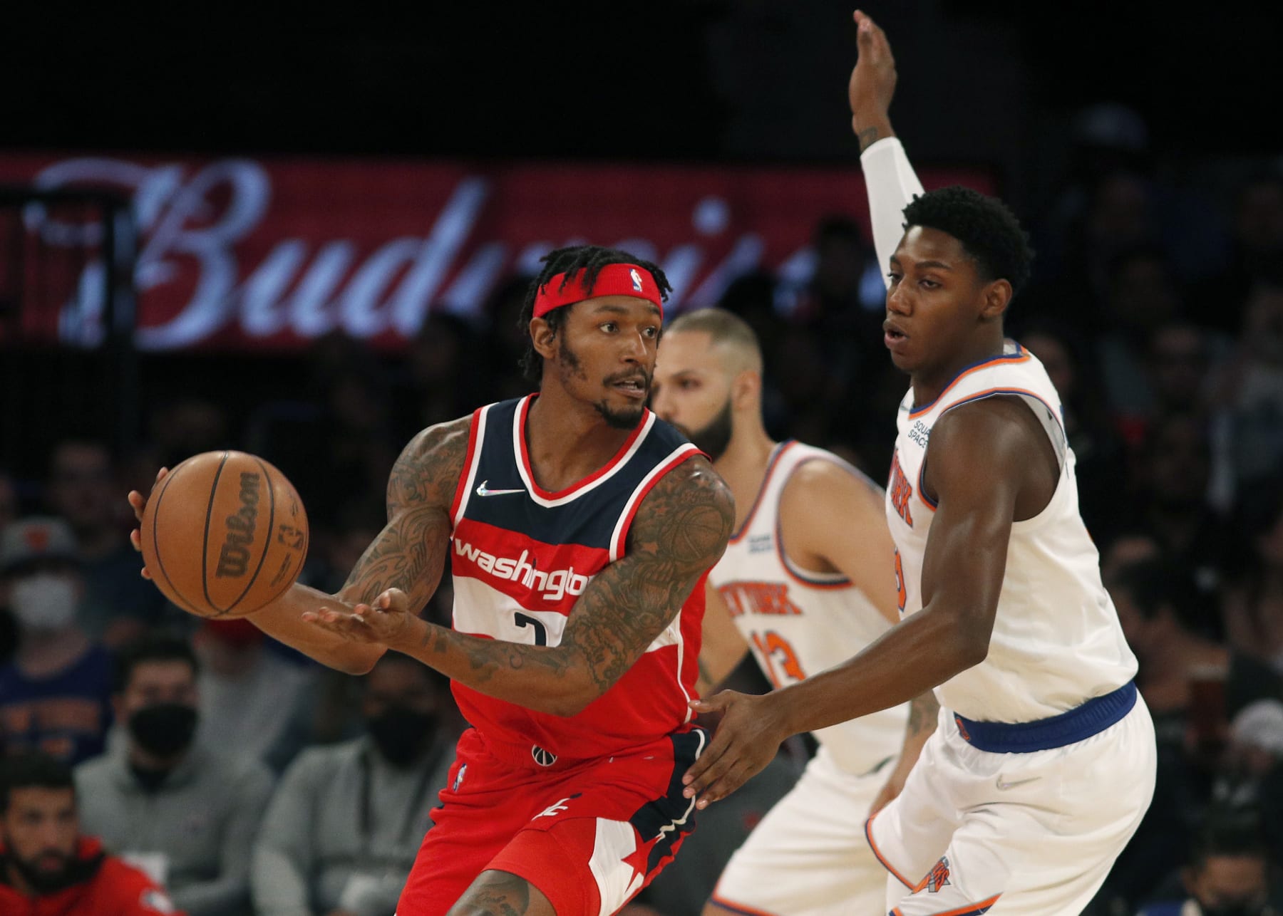 NEW YORK, NEW YORK - OCTOBER 15: (NEW YORK DAILIES OUT)  Bradley Beal #3 of the Washington Wizards in action against RJ Barrett #9 of the New York Knicks at Madison Square Garden on October 15, 2021 in New York City. The Knicks defeated the Wizards 115-113. NOTE TO USER: User expressly acknowledges and agrees that, by downloading and or using this photograph, user is consenting to the terms and conditions of the Getty Images License Agreement. (Photo by Jim McIsaac/Getty Images)