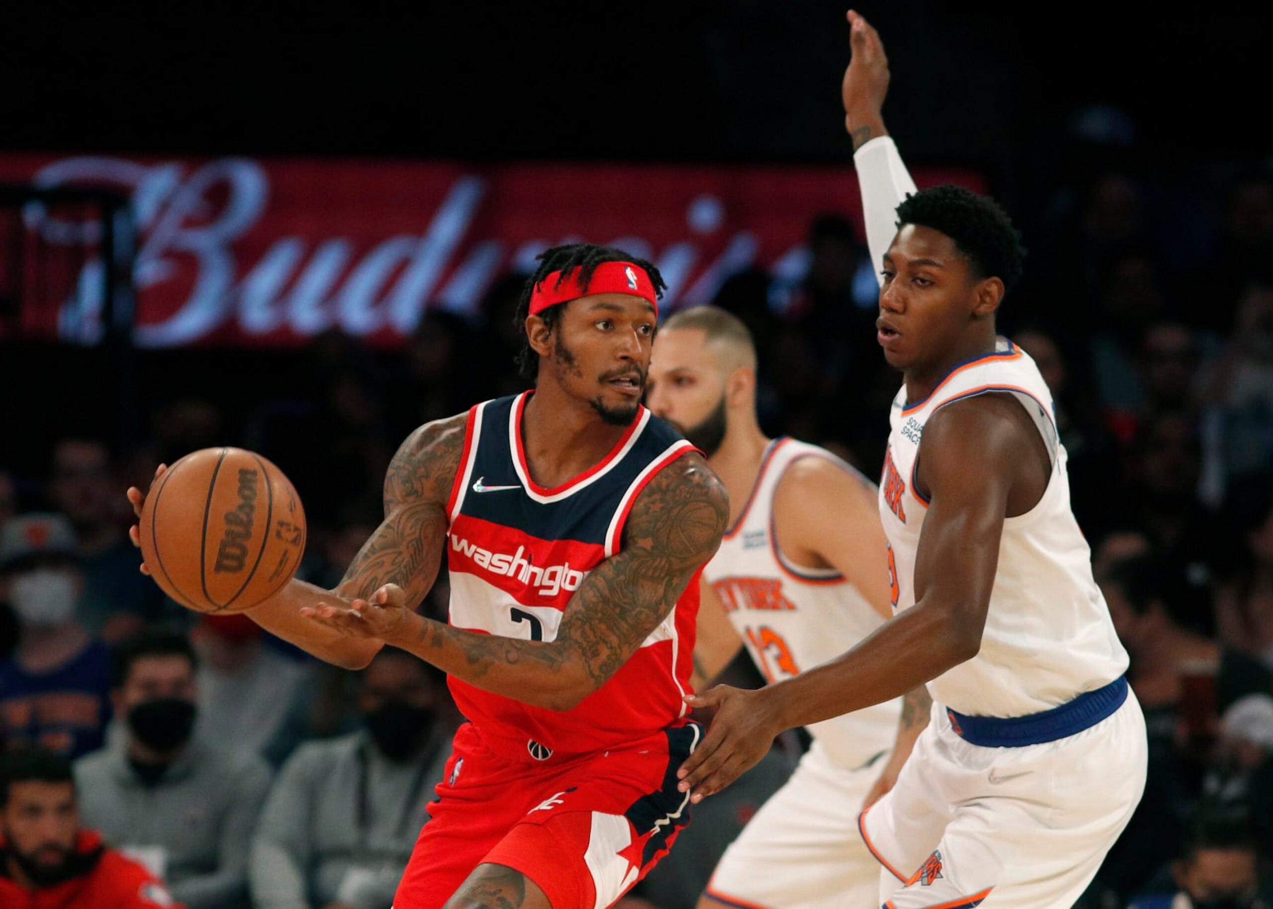 NEW YORK, NEW YORK - OCTOBER 15: (NEW YORK DAILIES OUT)  Bradley Beal #3 of the Washington Wizards in action against RJ Barrett #9 of the New York Knicks at Madison Square Garden on October 15, 2021 in New York City. The Knicks defeated the Wizards 115-113. NOTE TO USER: User expressly acknowledges and agrees that, by downloading and or using this photograph, user is consenting to the terms and conditions of the Getty Images License Agreement. (Photo by Jim McIsaac/Getty Images)