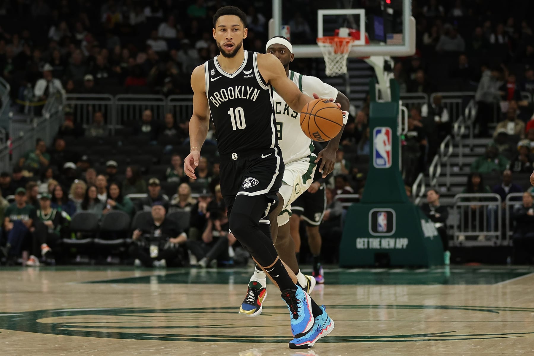 MILWAUKEE, WISCONSIN - OCTOBER 12: Ben Simmons #10 of the Brooklyn Nets handles the ball during a preseason game against the Milwaukee Bucks at Fiserv Forum on October 12, 2022 in Milwaukee, Wisconsin. NOTE TO USER: User expressly acknowledges and agrees that, by downloading and or using this photograph, User is consenting to the terms and conditions of the Getty Images License Agreement. (Photo by Stacy Revere/Getty Images)