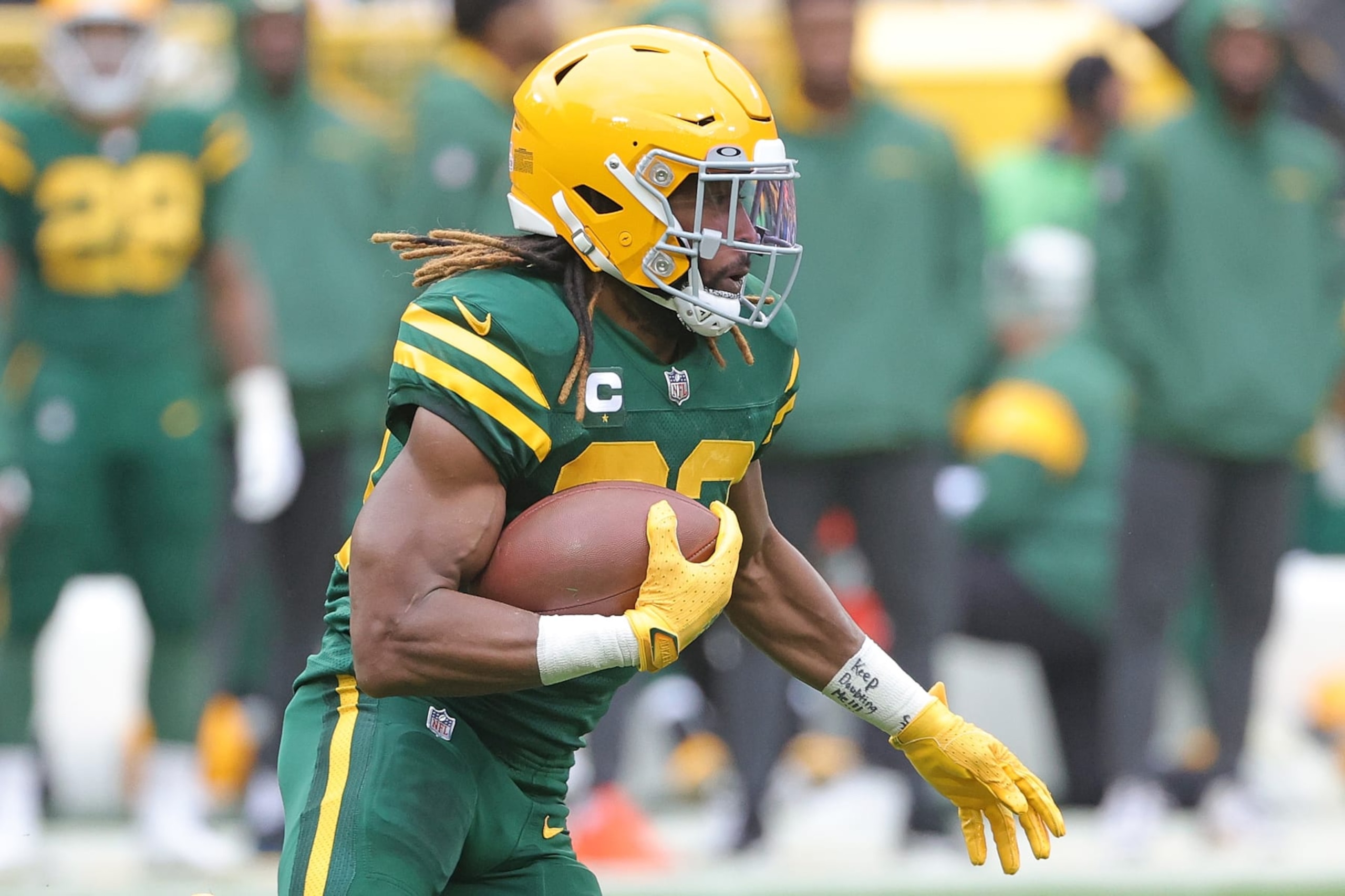 GREEN BAY, WISCONSIN - OCTOBER 16: Aaron Jones #33 of the Green Bay Packers runs for yards during a game against the New York Jets at Lambeau Field on October 16, 2022 in Green Bay, Wisconsin. The Jets defeated the Packers 27-10. (Photo by Stacy Revere/Getty Images) GREEN BAY, WISCONSIN - OCTOBER 16: Aaron Jones #33 of the Green Bay Packers runs for yards during a game against the New York Jets at Lambeau Field on October 16, 2022 in Green Bay, Wisconsin. The Jets defeated the Packers 27-10. (Photo by Stacy Revere/Getty Images)