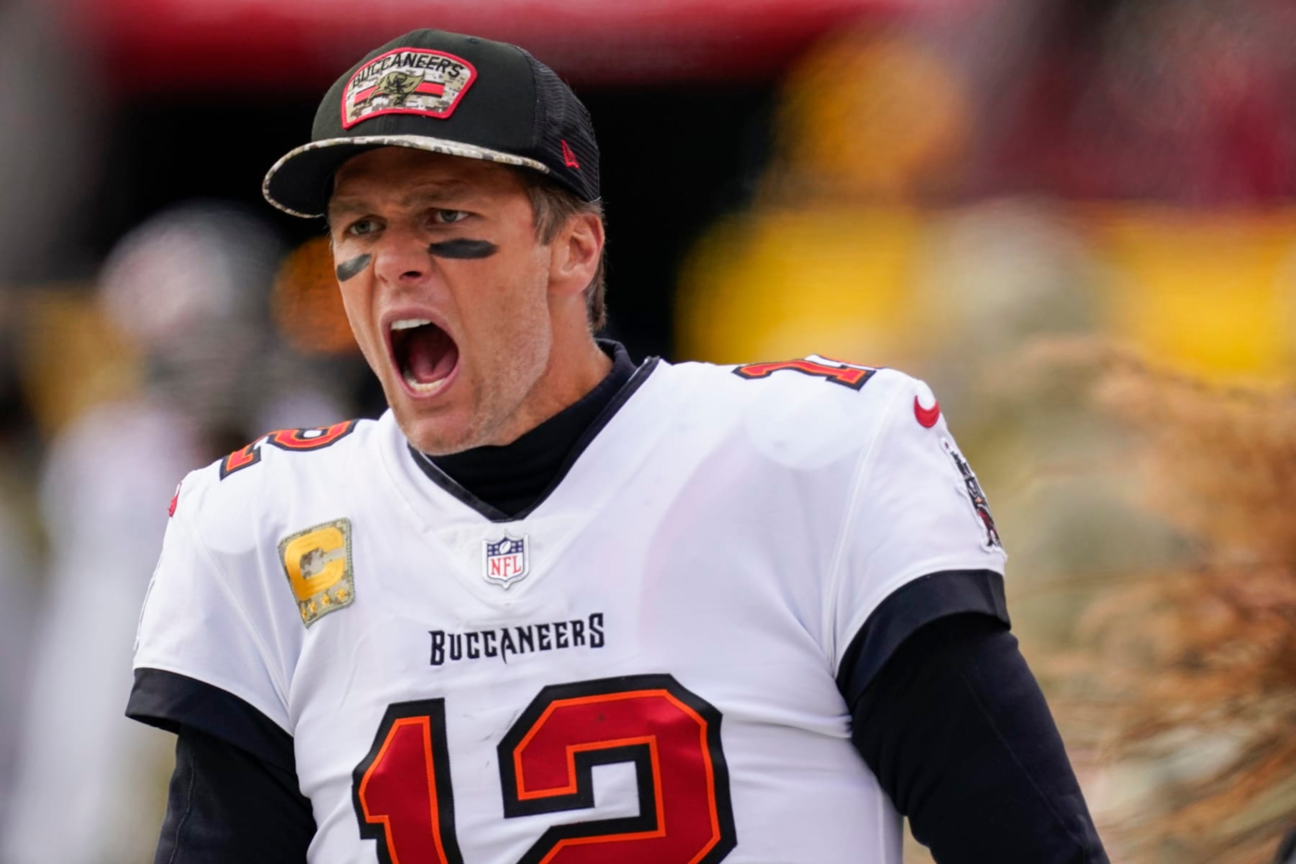 Tampa Bay Buccaneers quarterback Tom Brady yells at his team during the second half of an NFL football game against the Washington Football Team, Sunday, Nov. 14, 2021, in Landover, Md. (AP Photo/Patrick Semansky)