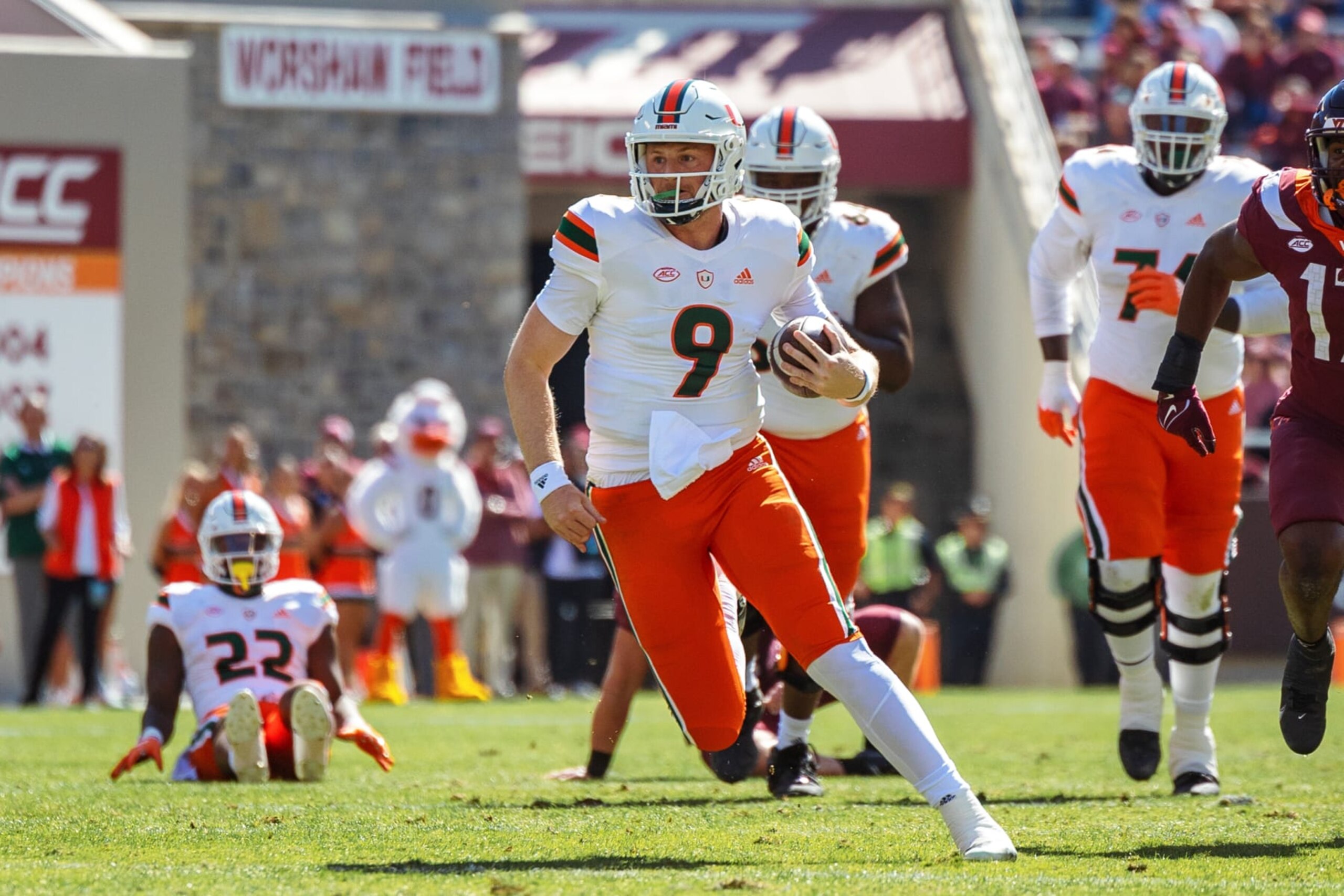 BLACKSBURG, VA - OCTOBER 15: Quarterback Tyler Van Dyke #9 of the Miami Hurricanes runs the ball against the Virginia Tech Hokies at Lane Stadium on October 15, 2022 in Blacksburg, Virginia. (Photo by Ryan Hunt/Getty Images)